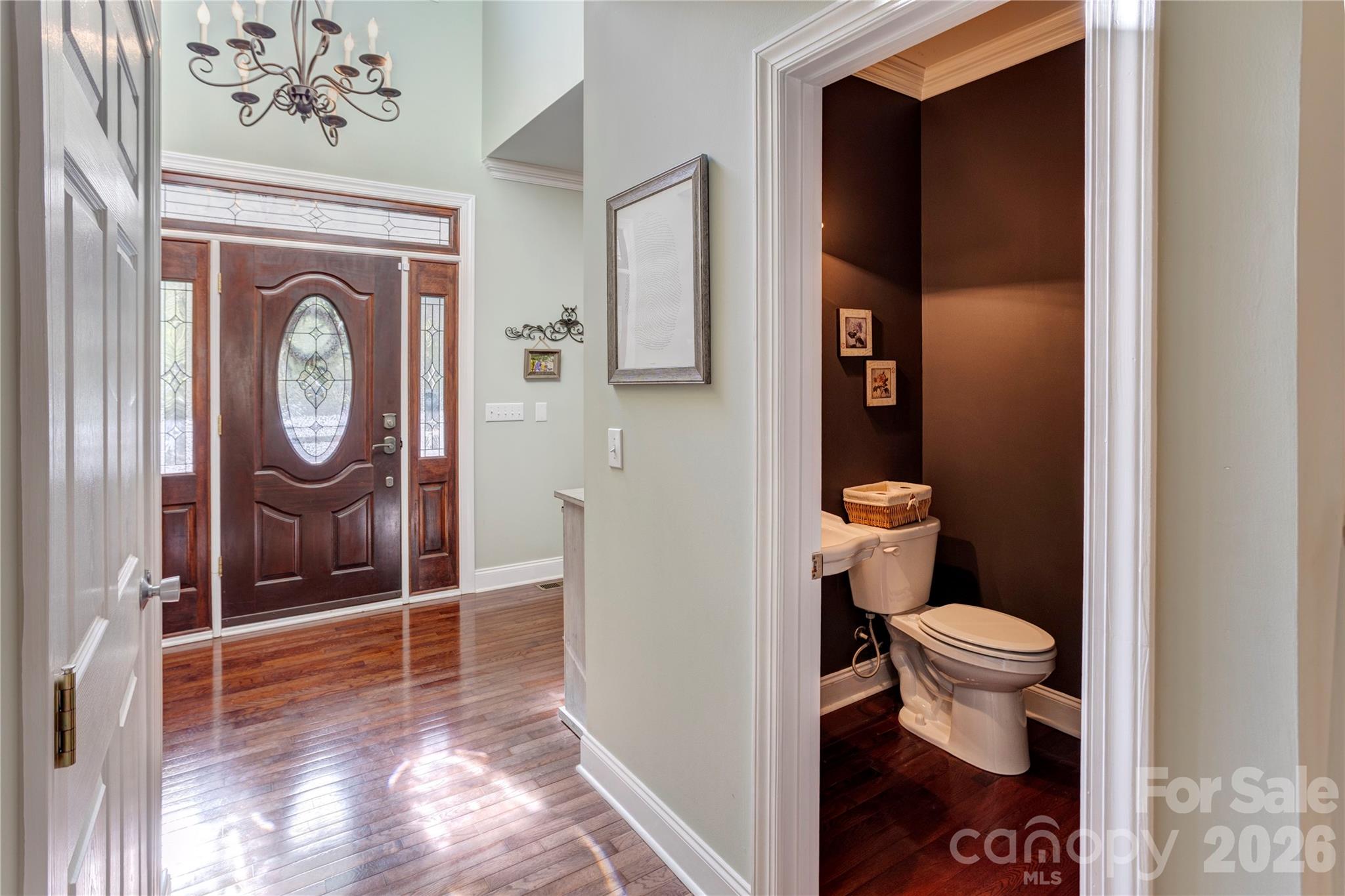 2715 Tabitha Lane Concord, NC 28025 - Photo 8 of 41 a bathroom with a toilet and a shower
