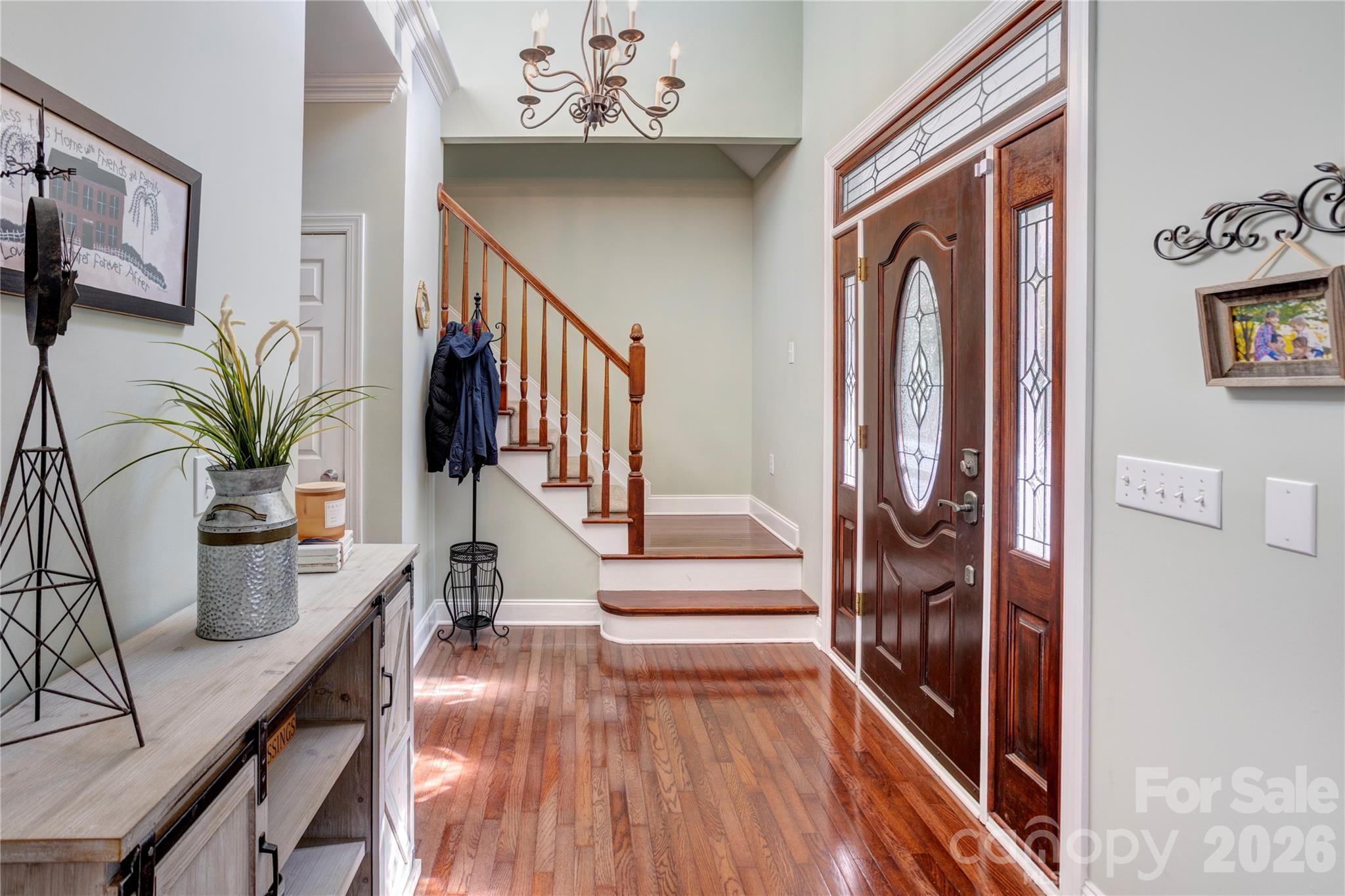 2715 Tabitha Lane Concord, NC 28025 - Photo 9 of 41 a view of entryway and hall with wooden floor