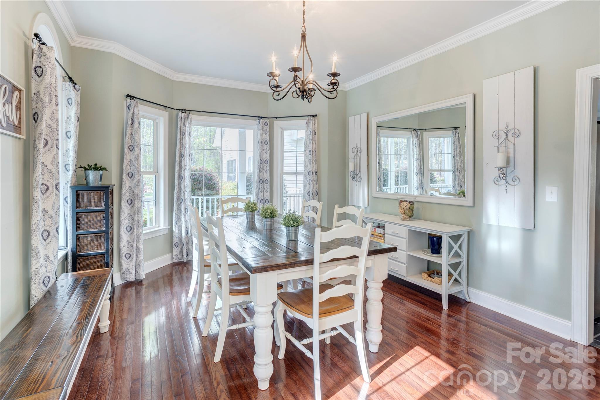 2715 Tabitha Lane Concord, NC 28025 - Photo 10 of 41 a view of a dining room with furniture window and wooden floor