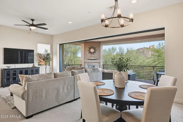 a view of a dining room with furniture window and outside view