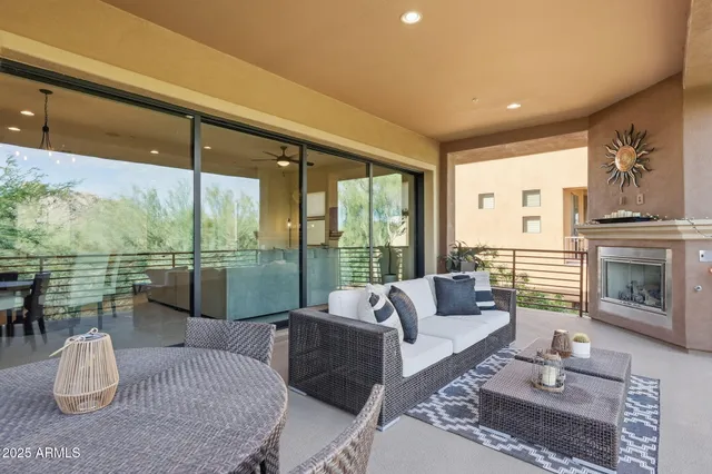 a bedroom with a bed couch and window