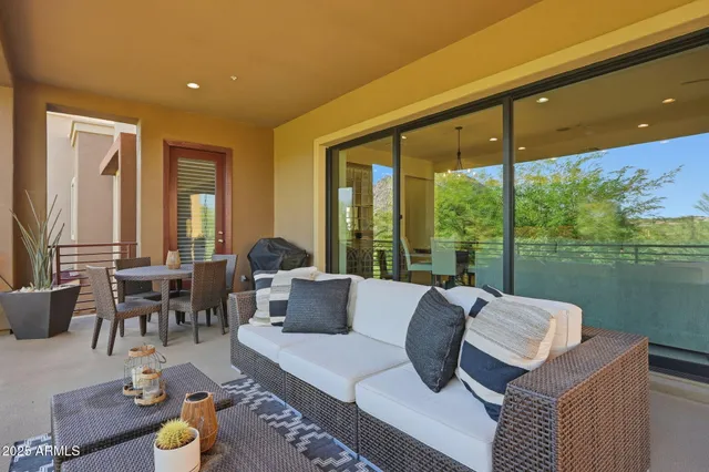 a bedroom with a bed and a lamp