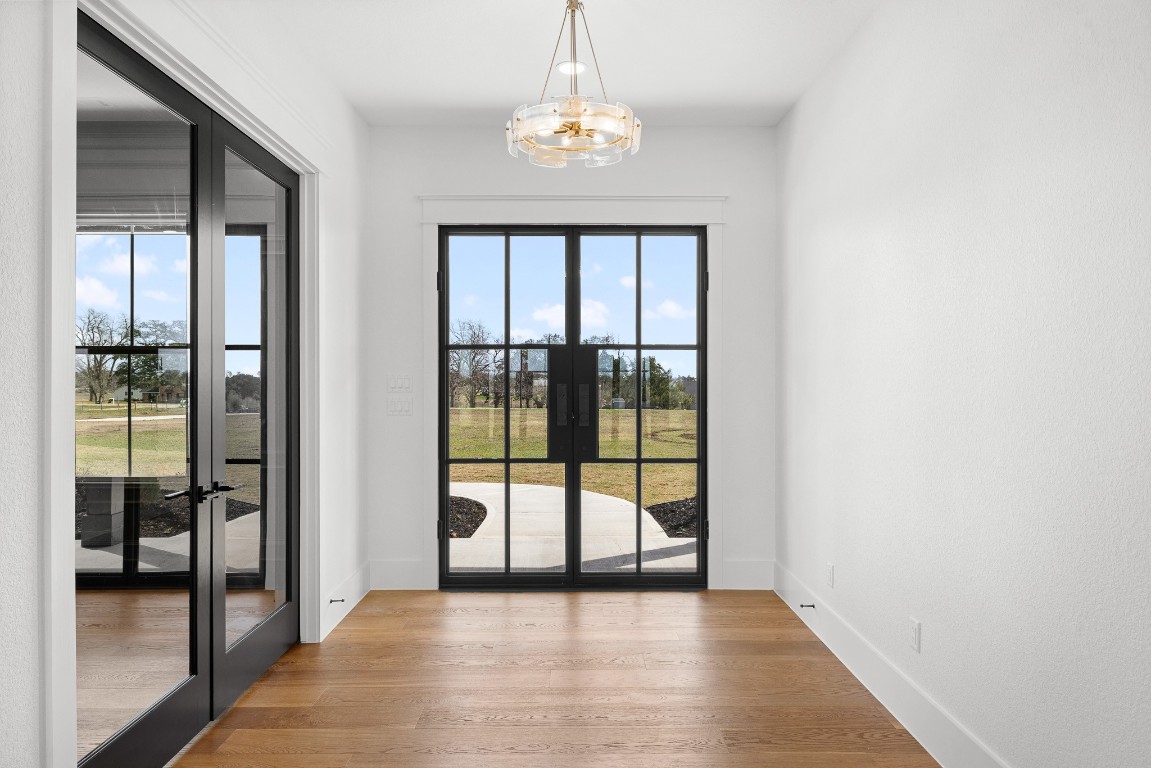 424 Pleasant Hill School Road Brenham, TX 77833 - Photo 11 of 26 a view of a bathroom with a glass door and a window