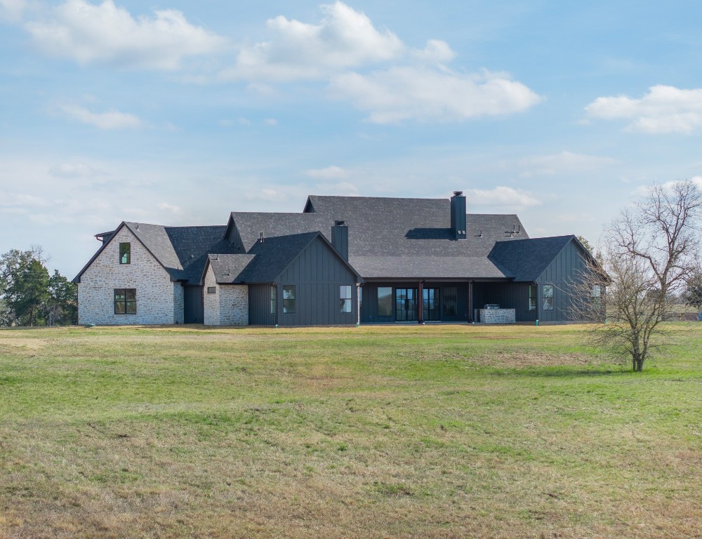 424 Pleasant Hill School Road Brenham, TX 77833 - Photo 24 of 26 a front view of a house with a yard