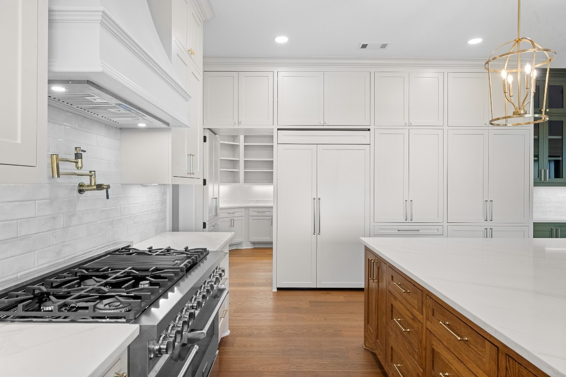 424 Pleasant Hill School Road Brenham, TX 77833 - Photo 6 of 26 a kitchen with granite countertop a sink stove and cabinets