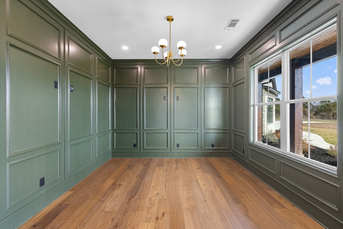424 Pleasant Hill School Road Brenham, TX 77833 - Photo 8 of 26 a view of empty room with window and wooden floor