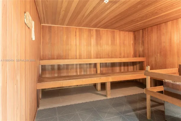 a view of a room with a window and table