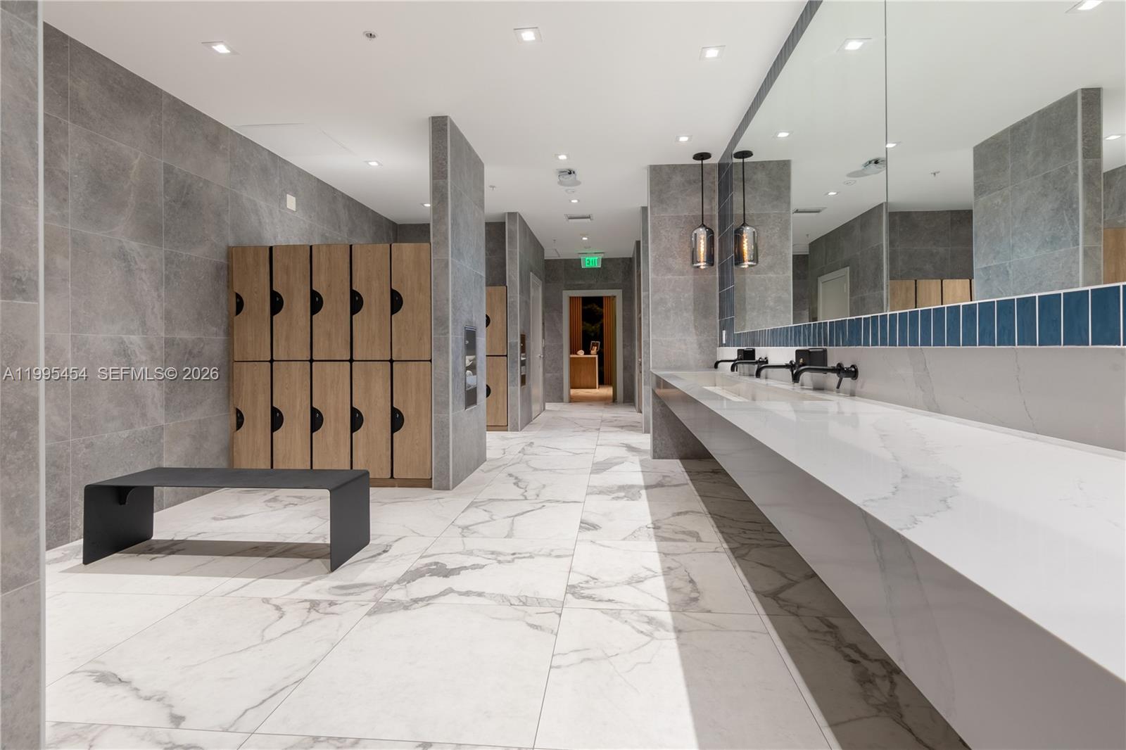 90 Southwest 3rd Street, Unit 3806 Miami, FL 33130 - Photo 26 of 32 a large hall with stainless steel appliances kitchen island granite countertop furniture and a fireplace