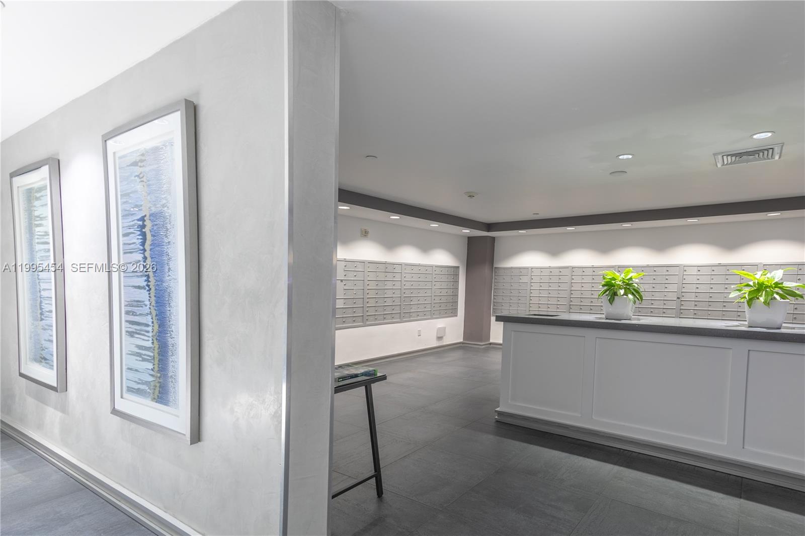 90 Southwest 3rd Street, Unit 3806 Miami, FL 33130 - Photo 30 of 32 a living room with hardwood floor and a large window