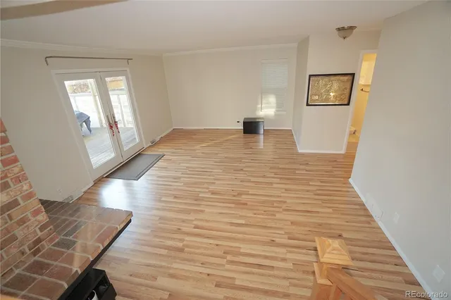 a view of a living room with furniture