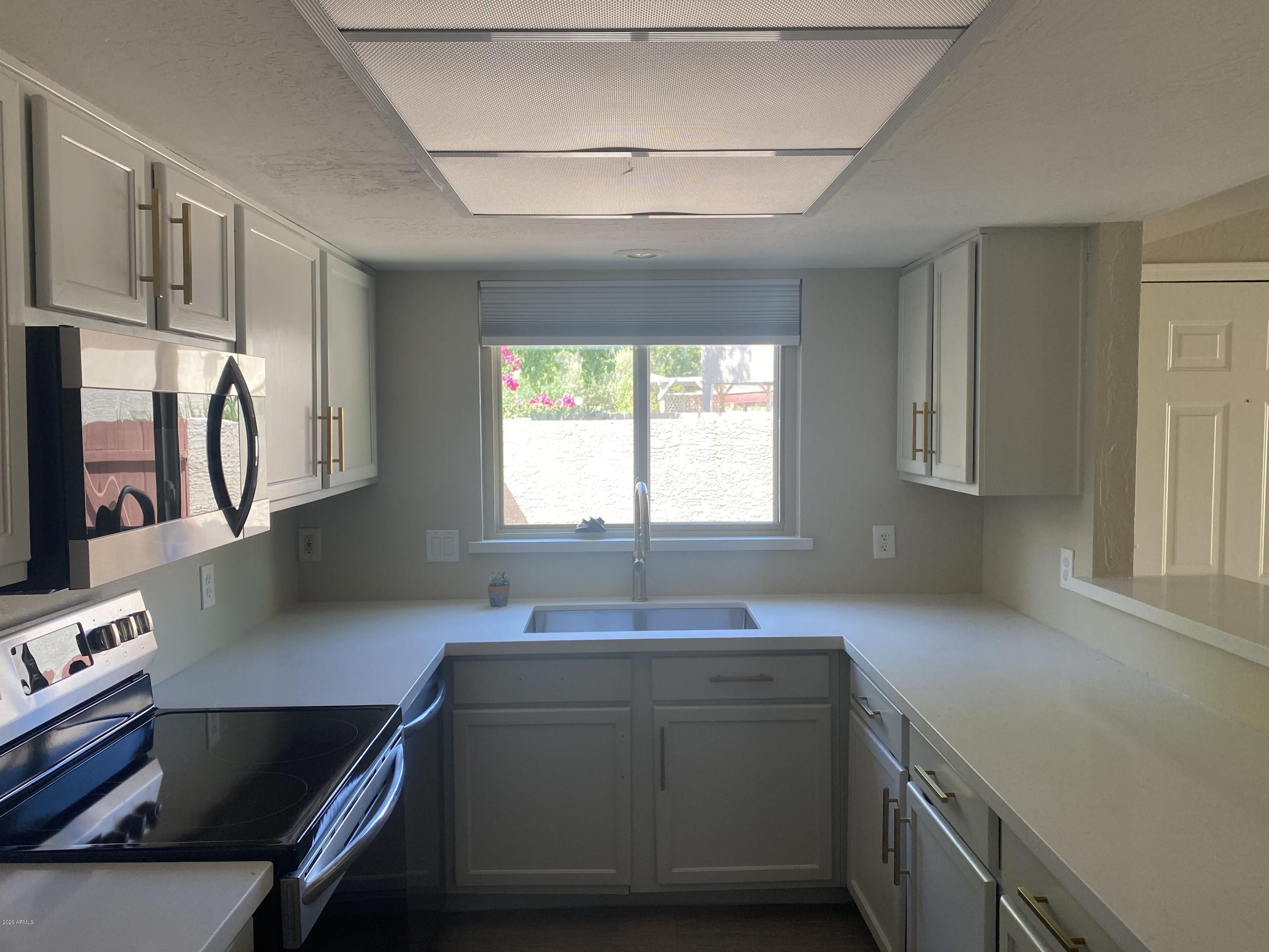 4202 West Calavar Road Phoenix, AZ 85053 - Photo 4 of 16 Remodeled Kitchen