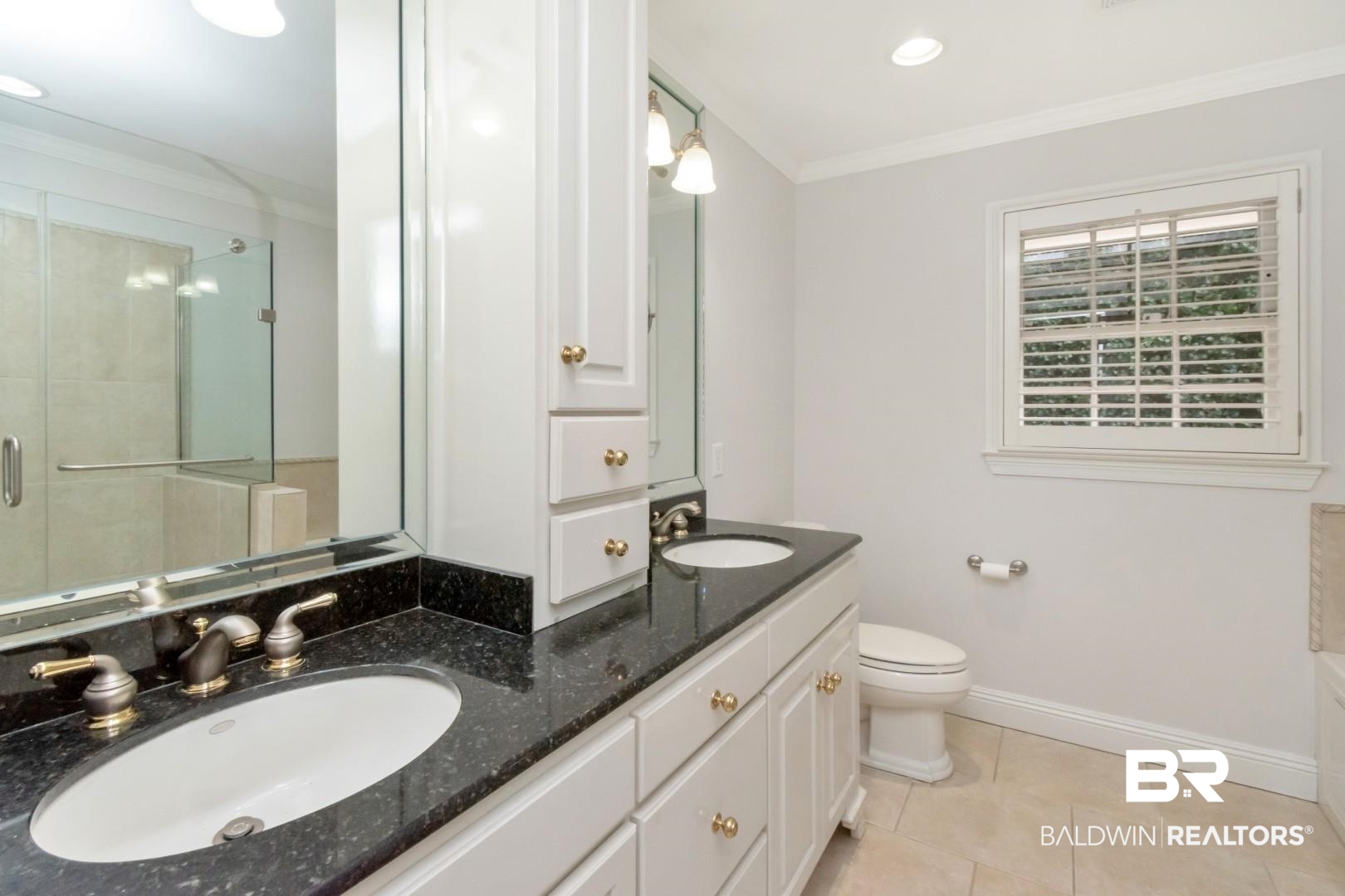 231 Rochester Road Mobile, AL 36608 - Photo 24 of 51 Full bathroom with double vanity, crown molding, a shower stall, light tile patterned floors, and recessed lighting