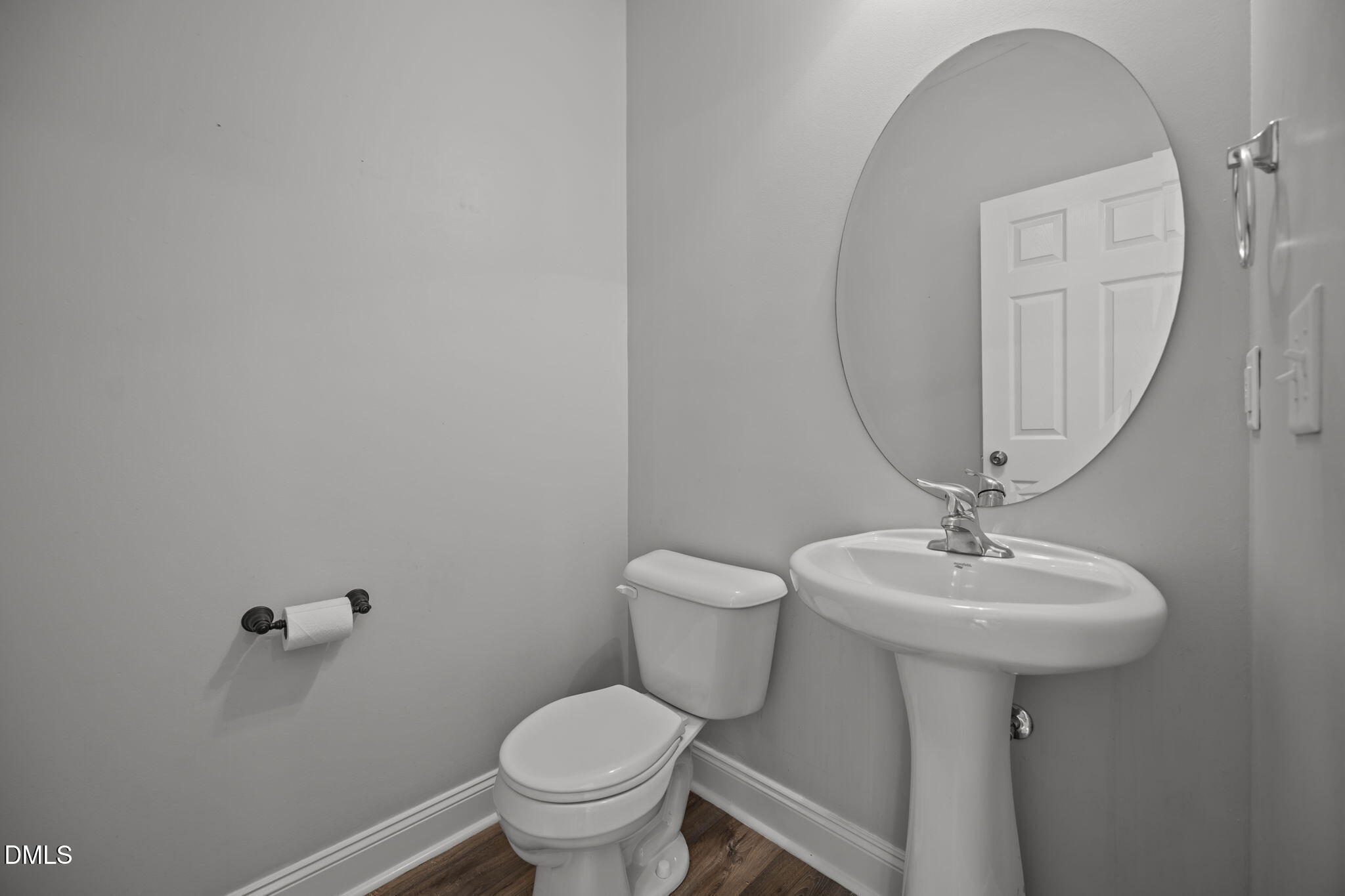 824 Lone Pine Loop Fuquay-Varina, NC 27526 - Photo 19 of 62 a bathroom with a toilet sink and mirror