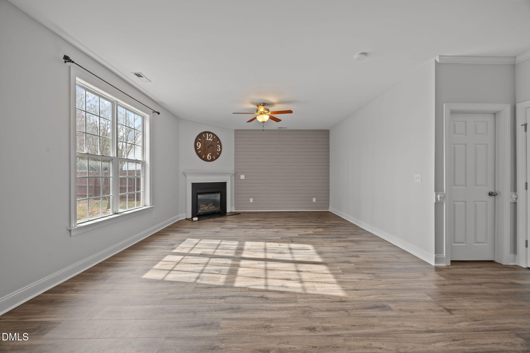 824 Lone Pine Loop Fuquay-Varina, NC 27526 - Photo 21 of 62 a view of empty room with wooden floor and window