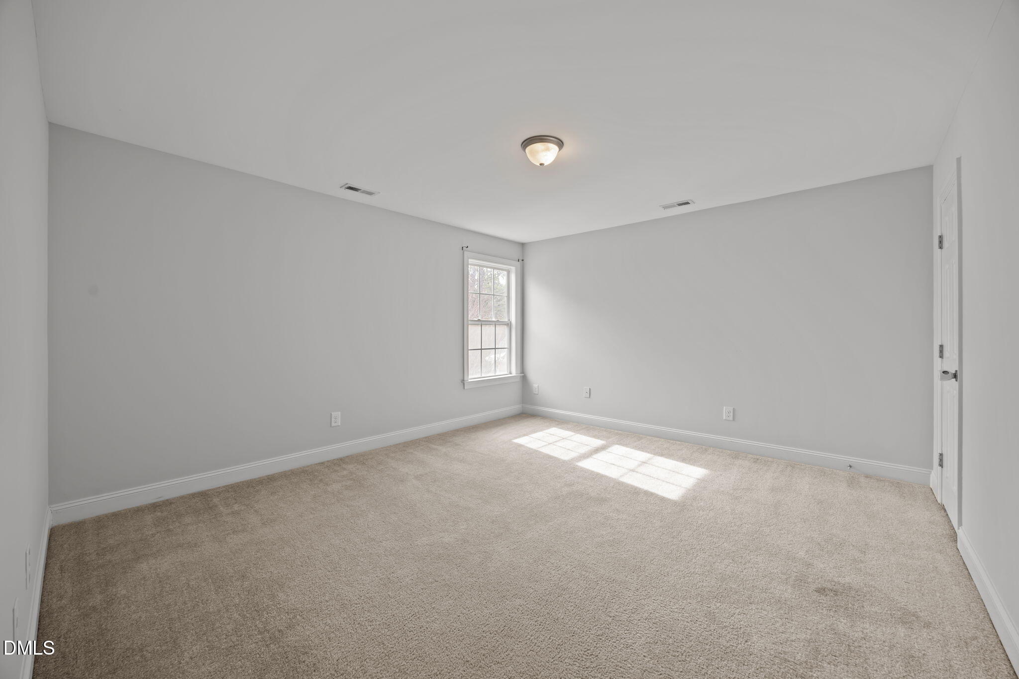 824 Lone Pine Loop Fuquay-Varina, NC 27526 - Photo 24 of 62 a view of an empty room with a window
