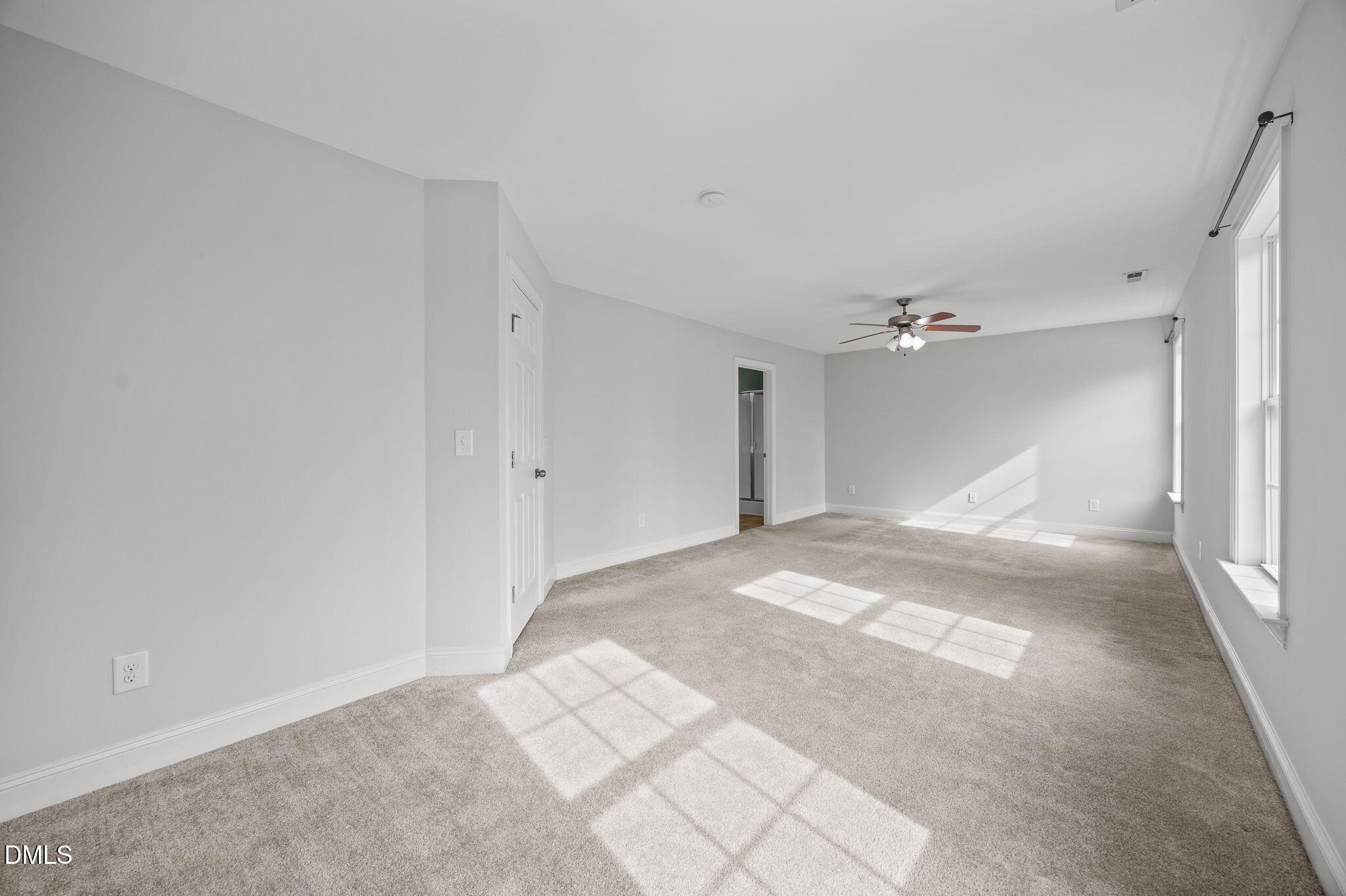 824 Lone Pine Loop Fuquay-Varina, NC 27526 - Photo 28 of 62 a view of a big room with a chandelier fan and closet area
