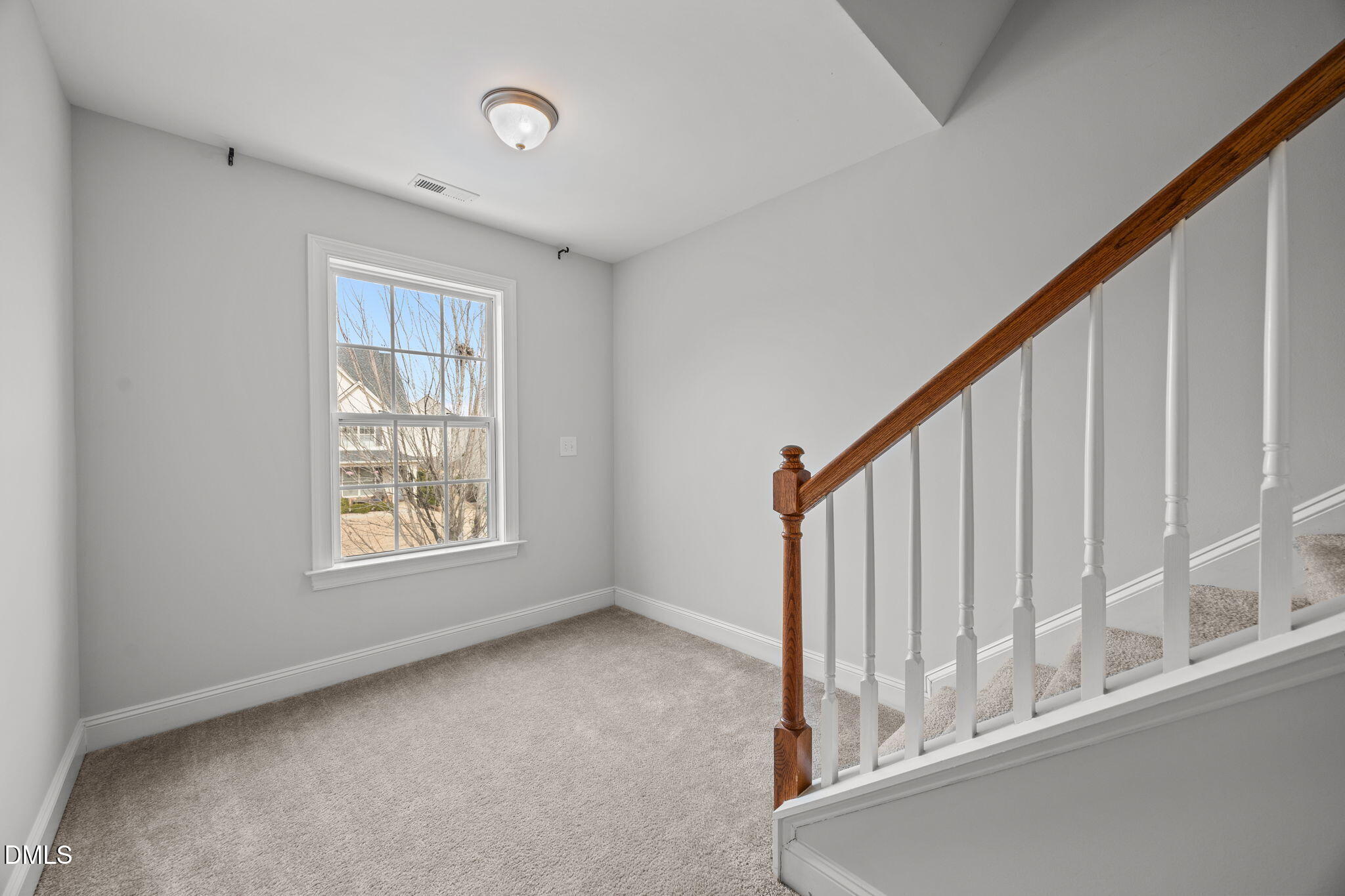 824 Lone Pine Loop Fuquay-Varina, NC 27526 - Photo 35 of 62 a view of an entryway with wooden floor