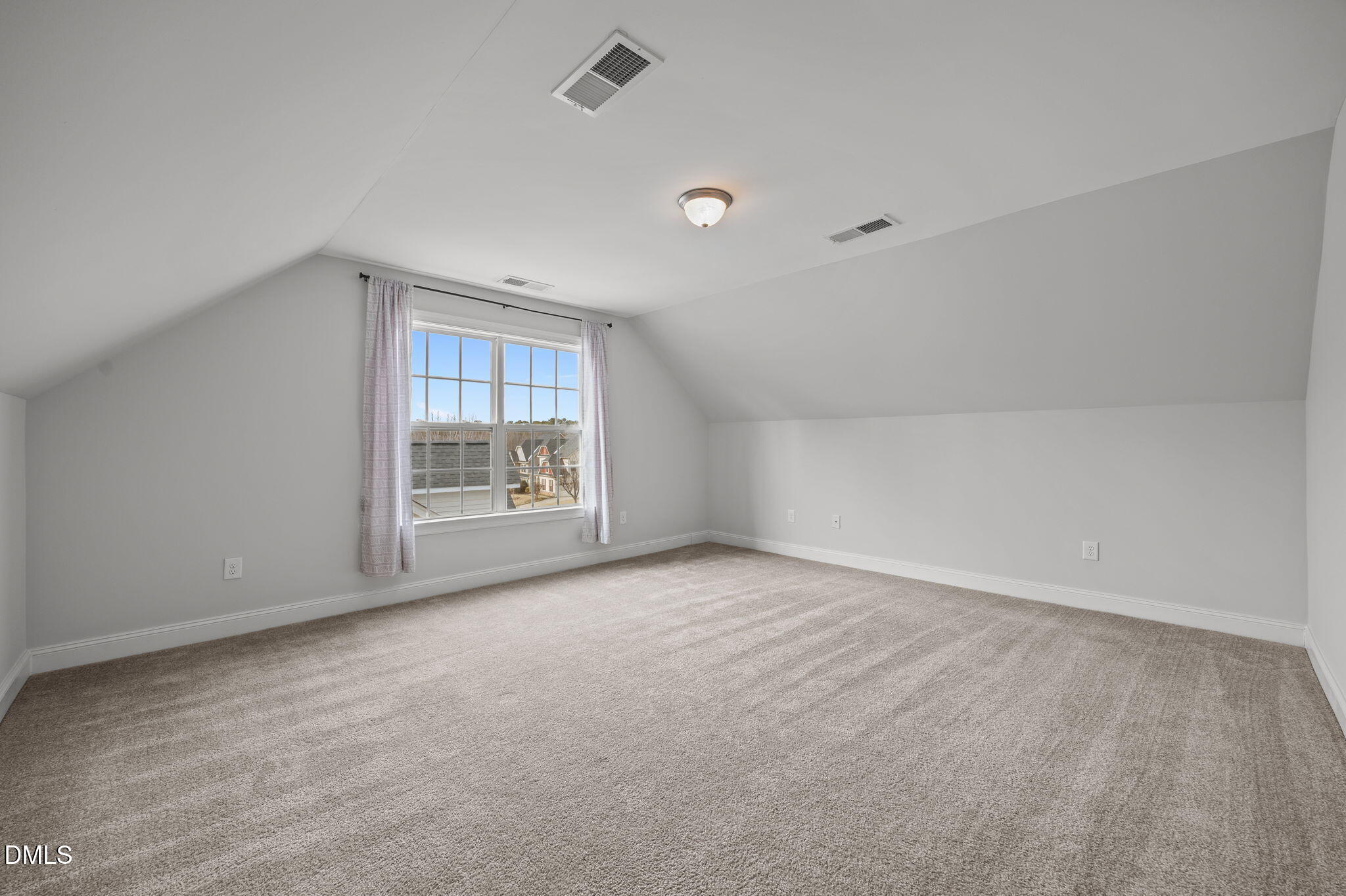 824 Lone Pine Loop Fuquay-Varina, NC 27526 - Photo 39 of 62 a view of an empty room with a window