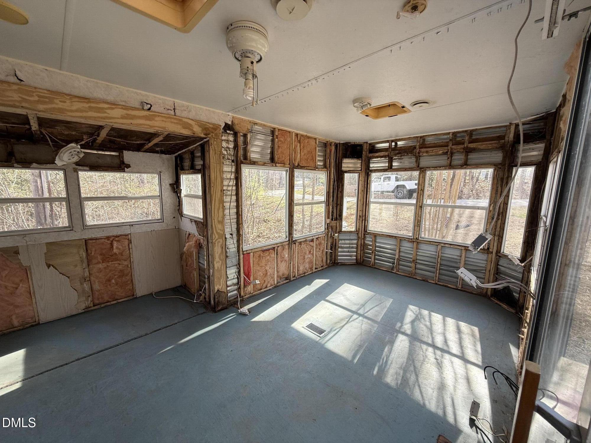 105 Kansas Drive Spring Hope, NC 27882 - Photo 17 of 54 a view of an empty room with windows