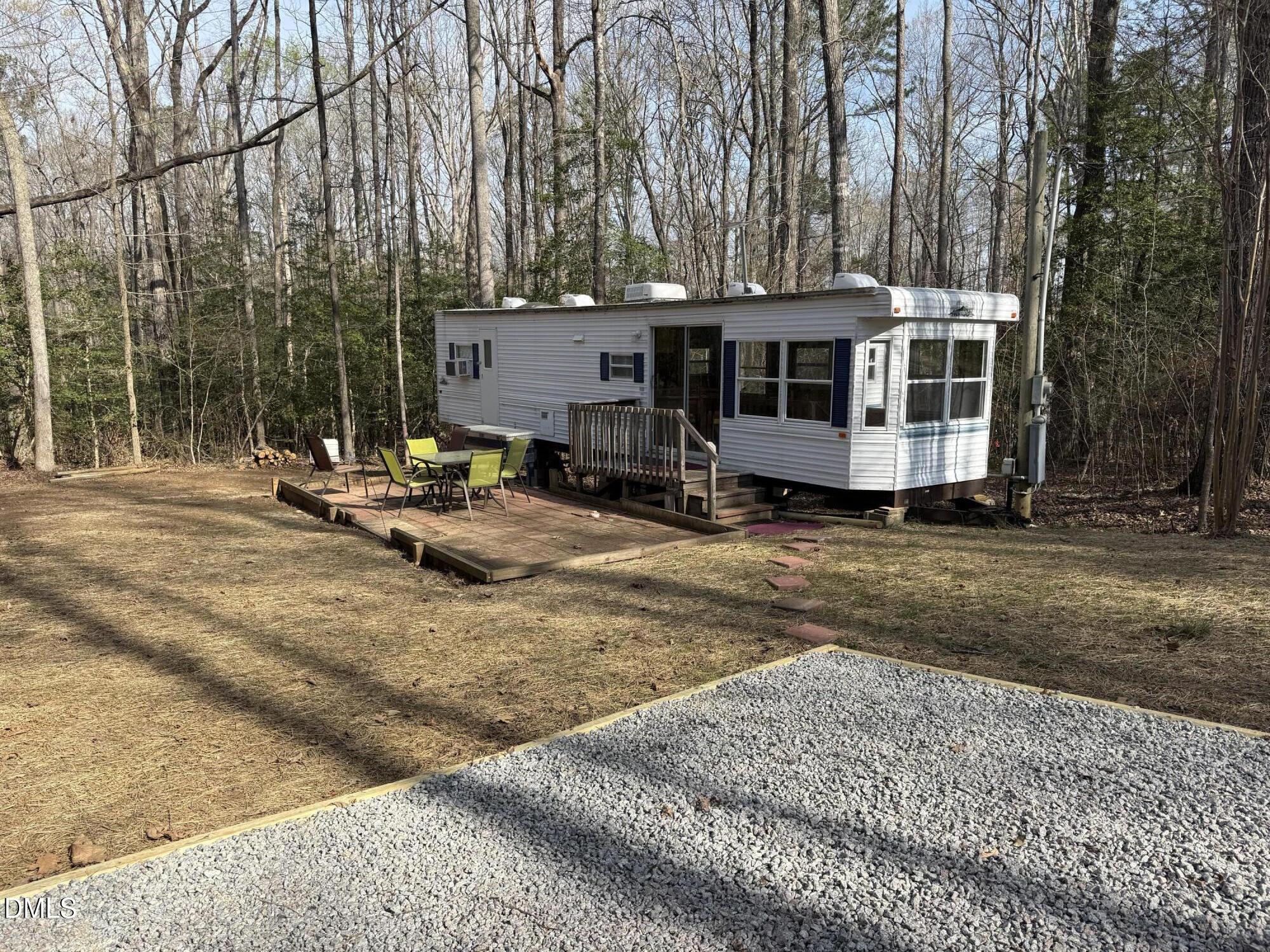 105 Kansas Drive Spring Hope, NC 27882 - Photo 6 of 54 a view of a house with backyard and sitting area