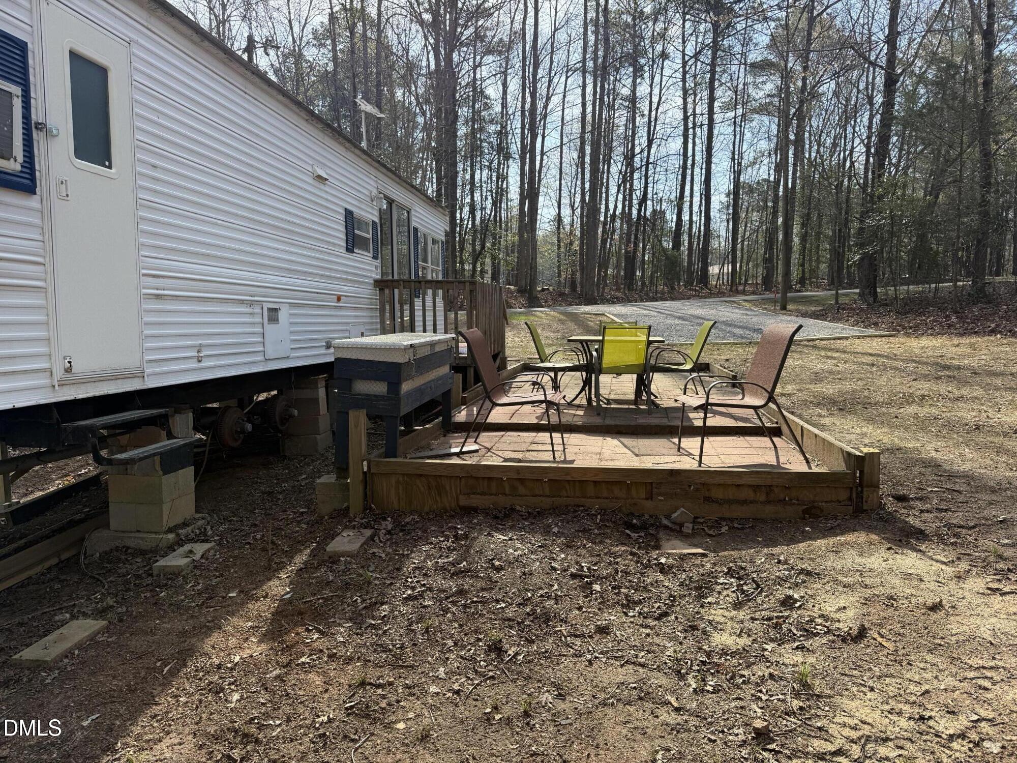 105 Kansas Drive Spring Hope, NC 27882 - Photo 9 of 54 a view of a swimming pool with a lounge chair