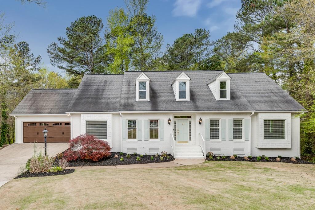 front view of a house with a yard