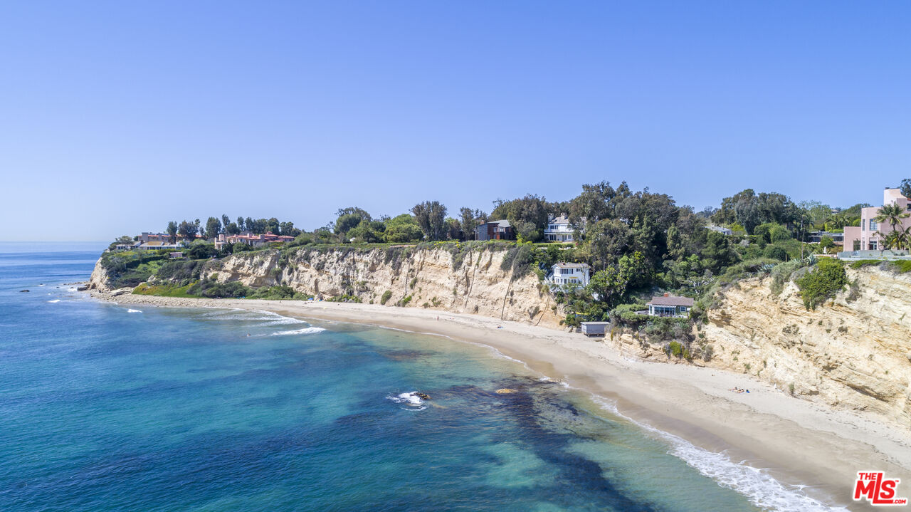 6728 Wildlife Road Malibu, CA 90265 - Photo 56 of 57 a view of a beach with a yard