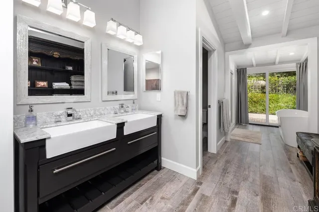 a view of kitchen and dining room with wooden floor