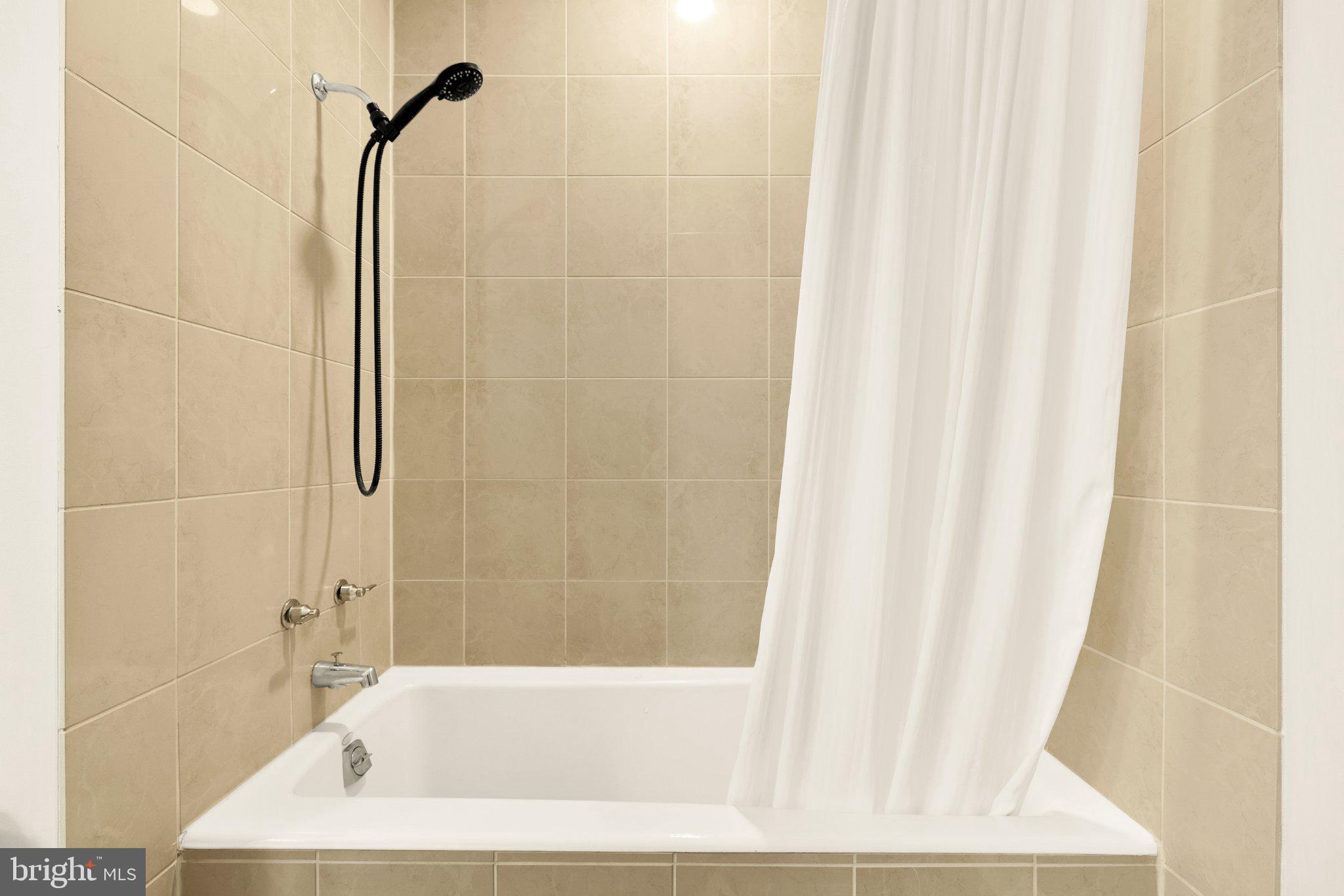 675 E Street Northwest, Unit 350 Washington, DC 20004 - Photo 11 of 29 Sleek and modern bathroom retreat.