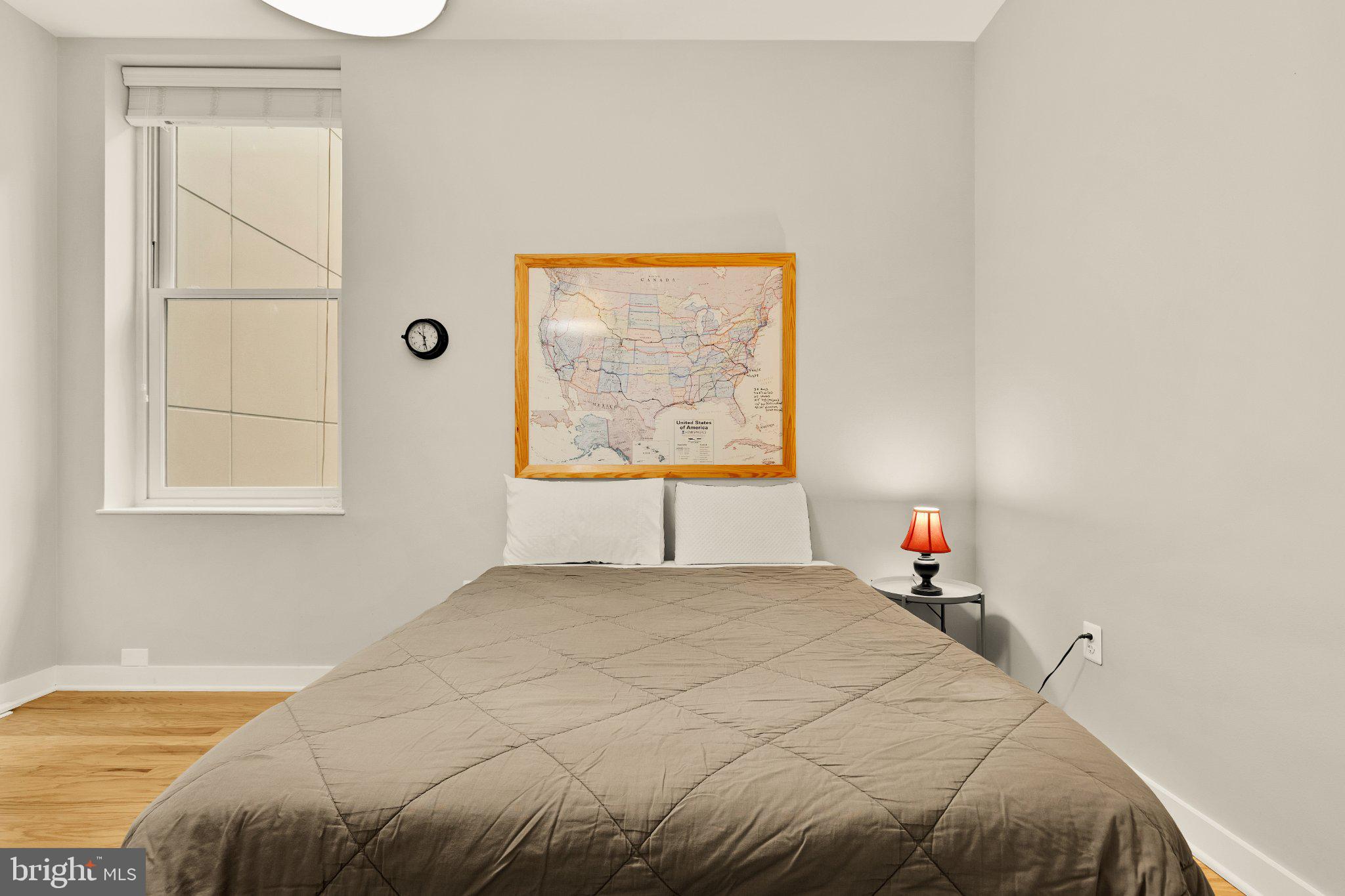 675 E Street Northwest, Unit 350 Washington, DC 20004 - Photo 13 of 29 Cozy retreat with map decor.