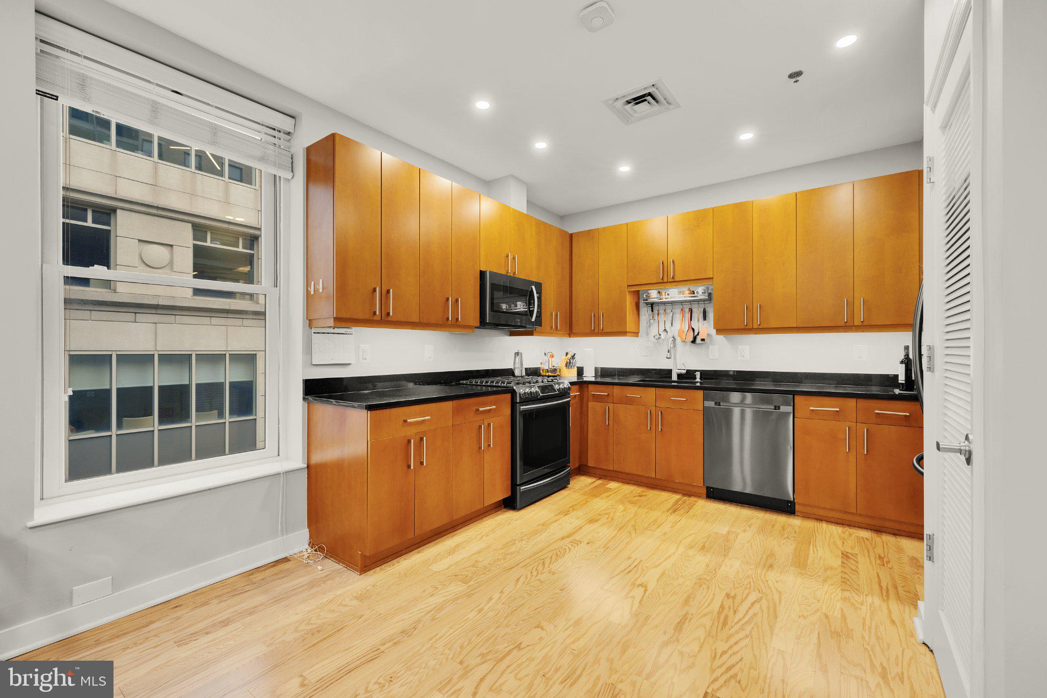 675 E Street Northwest, Unit 350 Washington, DC 20004 - Photo 15 of 29 Modern kitchen with sleek finishes.