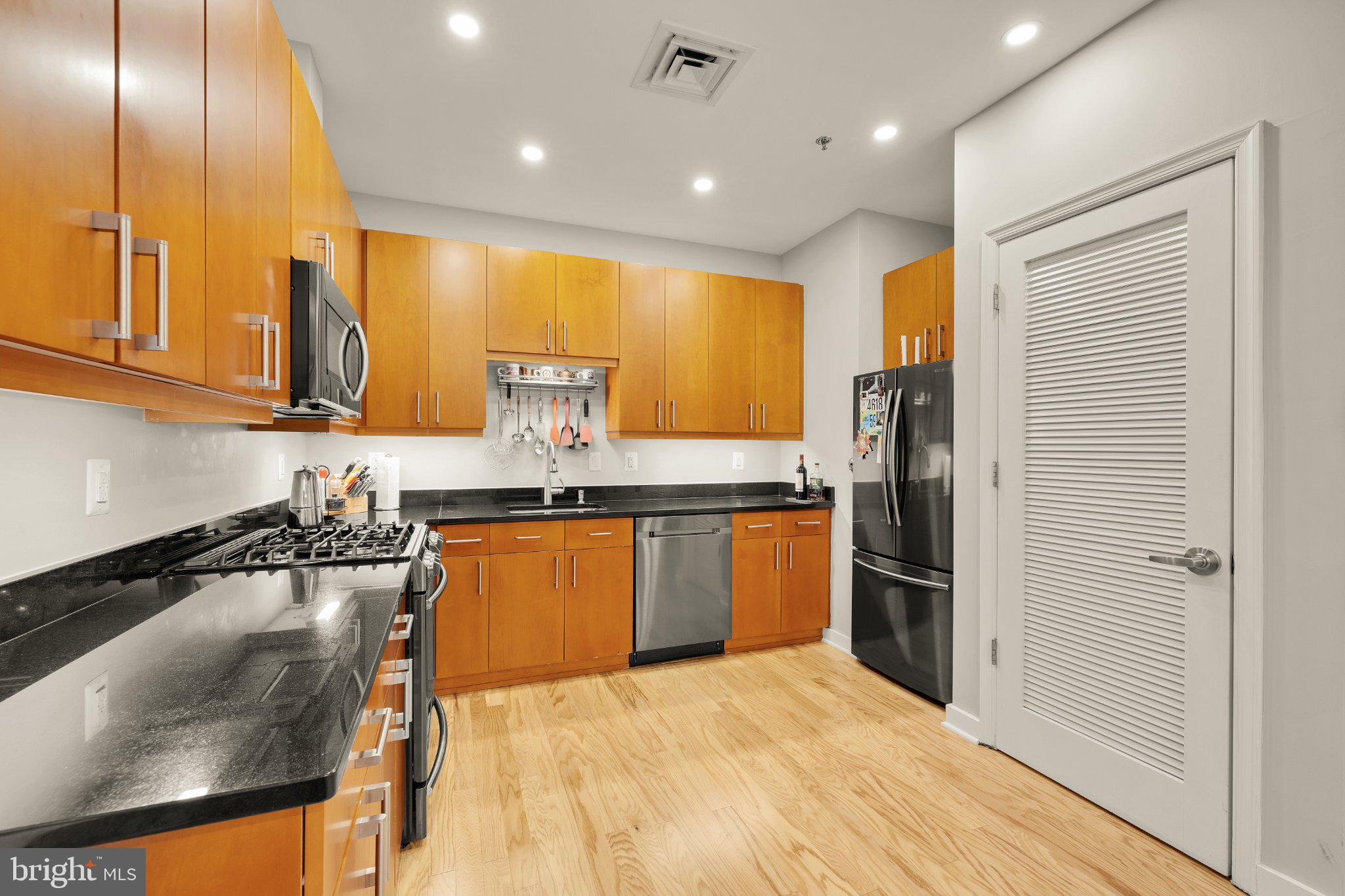 675 E Street Northwest, Unit 350 Washington, DC 20004 - Photo 17 of 29 Modern kitchen with sleek finishes.