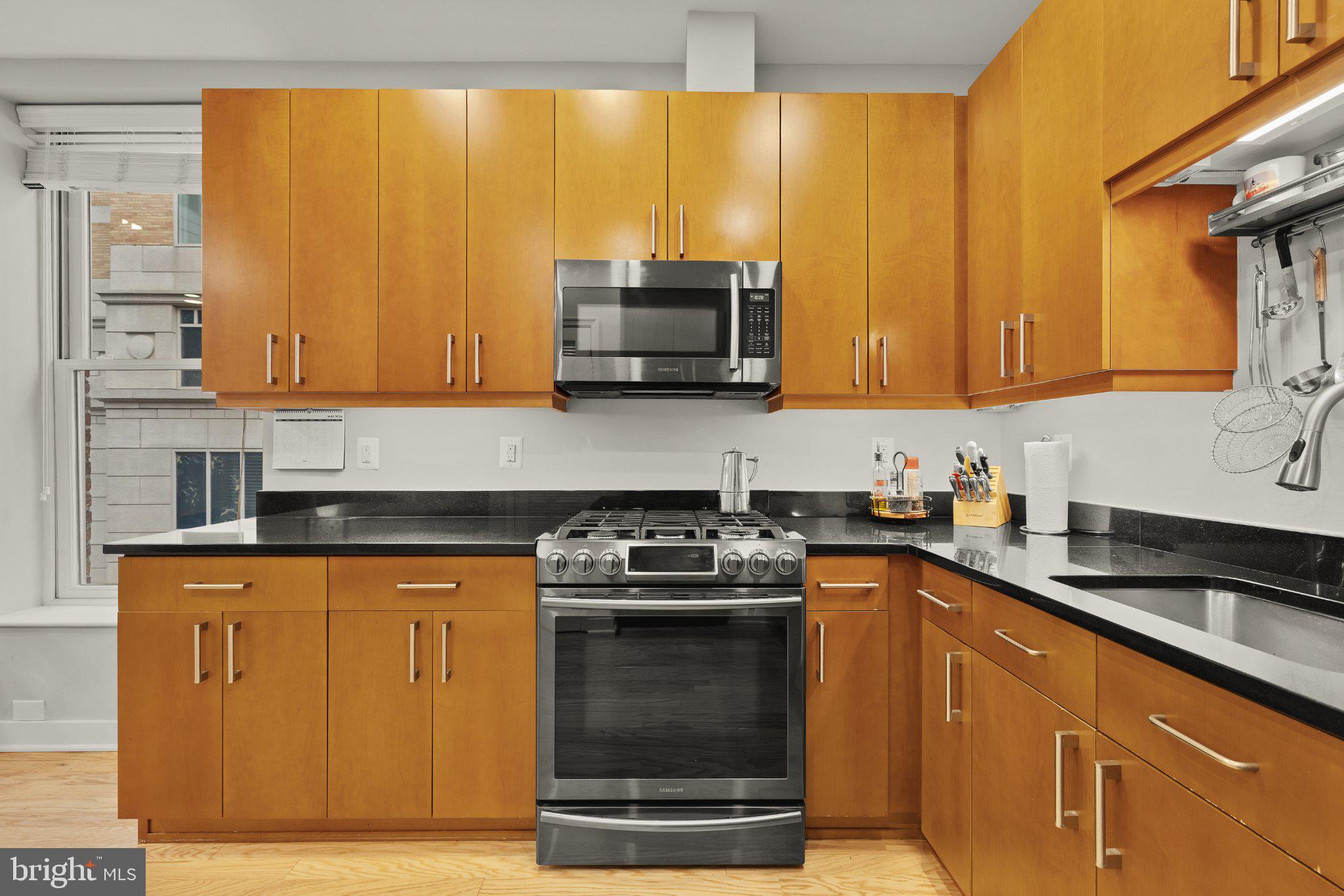675 E Street Northwest, Unit 350 Washington, DC 20004 - Photo 19 of 29 Modern kitchen with sleek finishes.