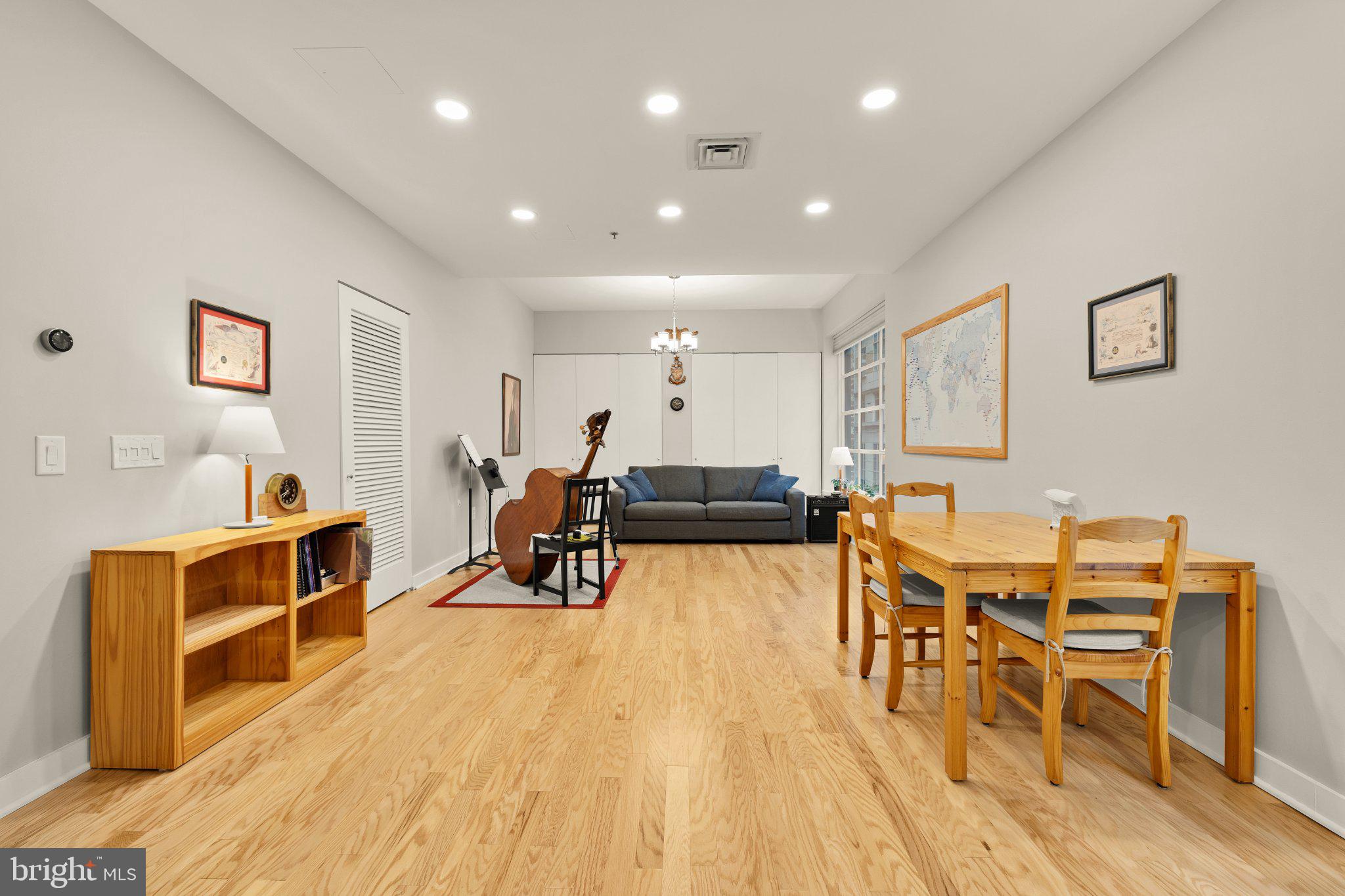 675 E Street Northwest, Unit 350 Washington, DC 20004 - Photo 20 of 29 Spacious living area with warm tones.