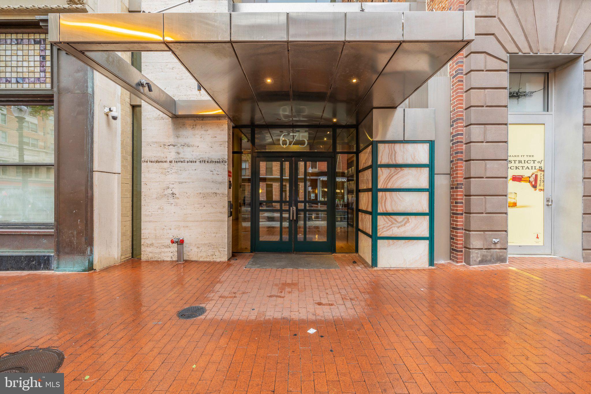 675 E Street Northwest, Unit 350 Washington, DC 20004 - Photo 2 of 29 Modern entrance with sleek design.