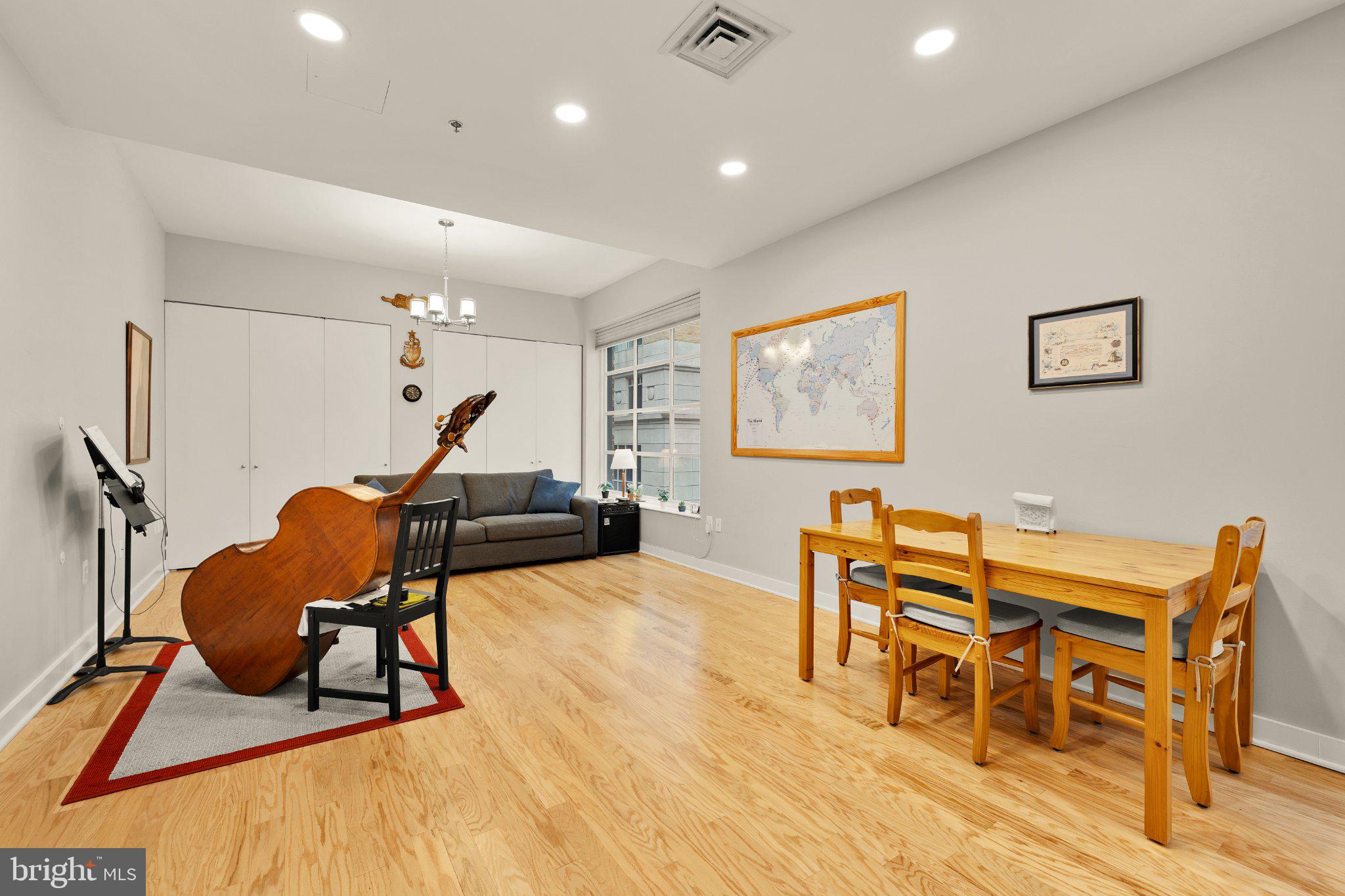 675 E Street Northwest, Unit 350 Washington, DC 20004 - Photo 21 of 29 Spacious living area with artistic flair.
