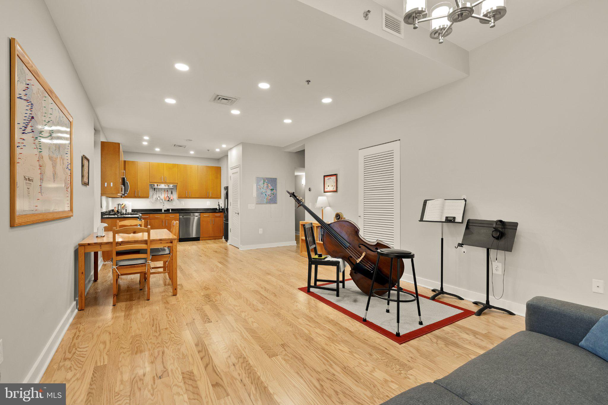 675 E Street Northwest, Unit 350 Washington, DC 20004 - Photo 23 of 29 Spacious living area with musical charm.