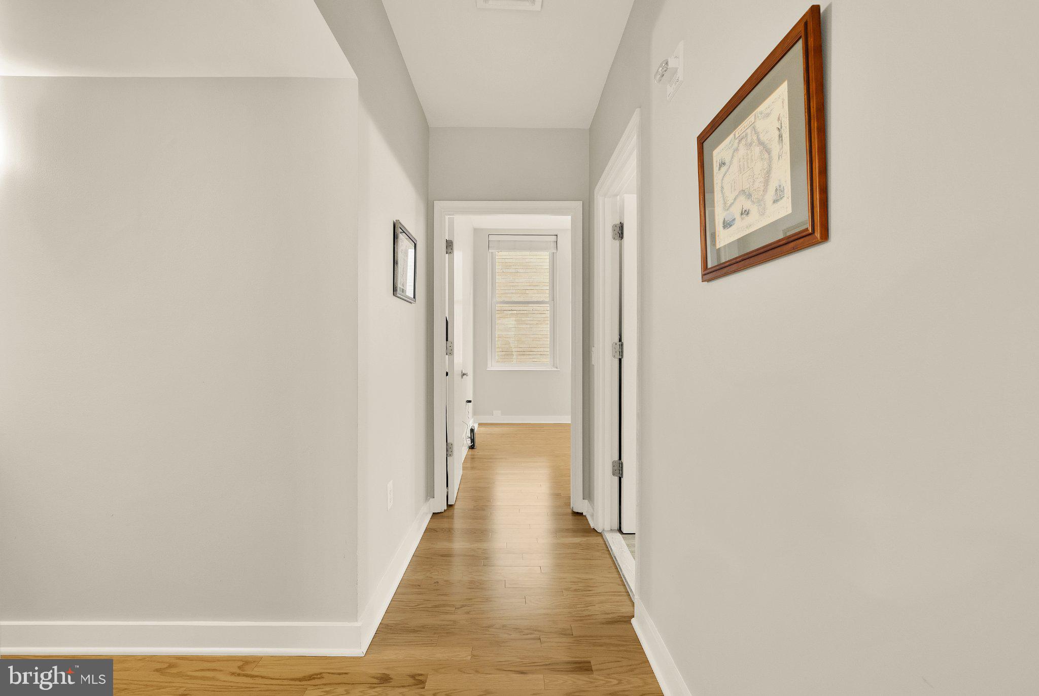 675 E Street Northwest, Unit 350 Washington, DC 20004 - Photo 7 of 29 Inviting hallway with natural light.