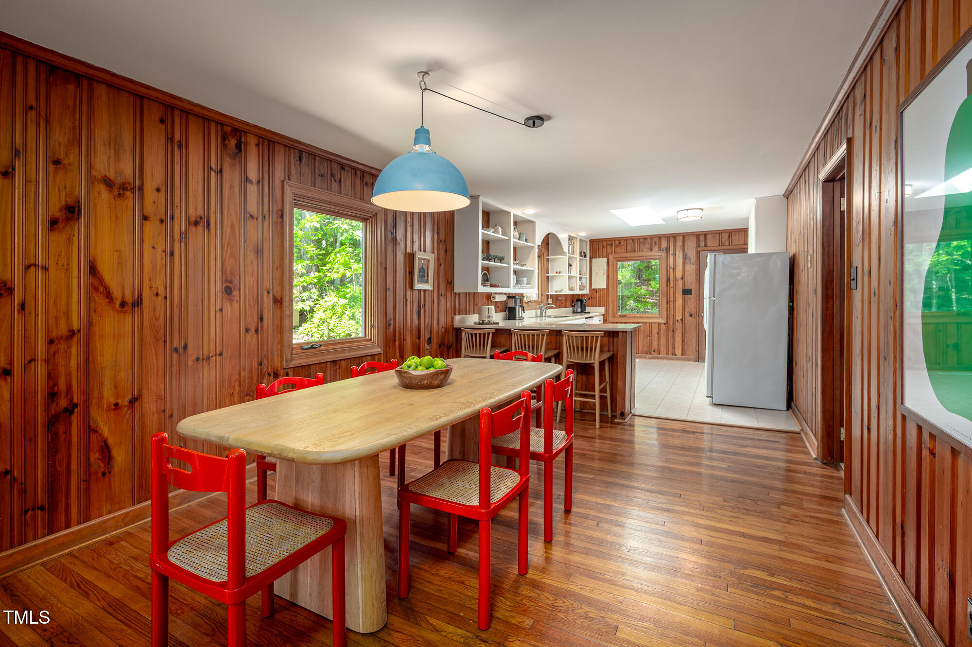7723 Johnson Mill Road Bahama, NC 27503 - Photo 12 of 58 a view of a dining room with furniture window and wooden floor