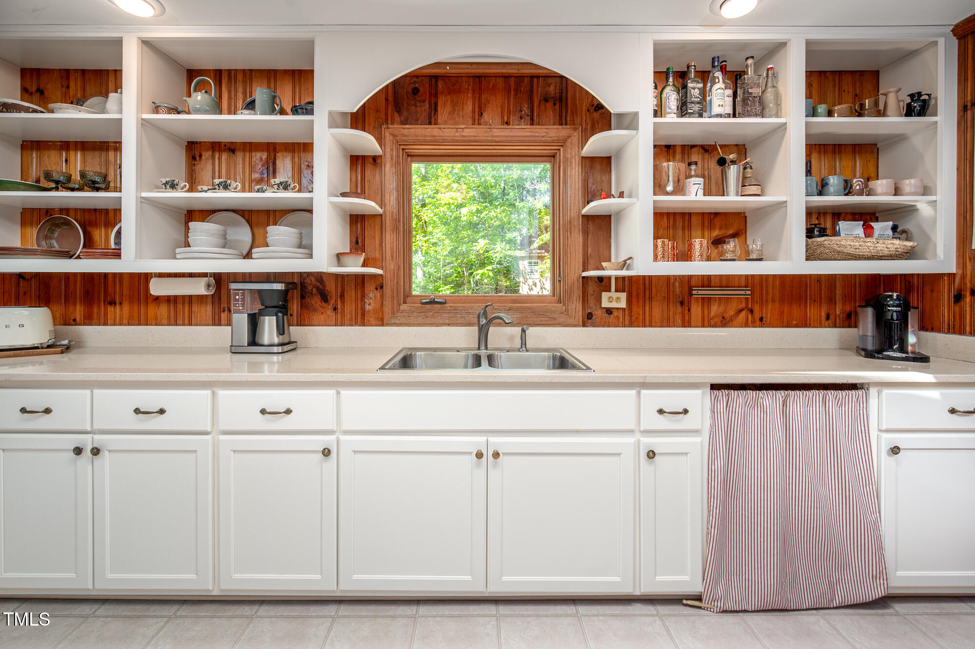 7723 Johnson Mill Road Bahama, NC 27503 - Photo 15 of 58 a kitchen with cabinets and a window