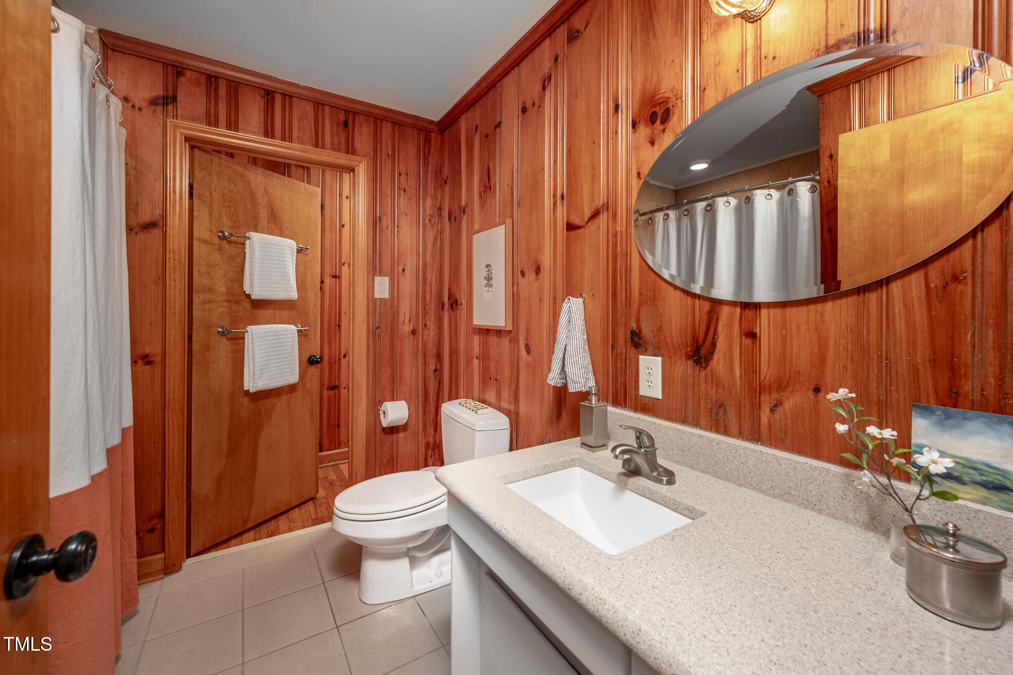 7723 Johnson Mill Road Bahama, NC 27503 - Photo 18 of 58 a bathroom with a sink a toilet and shower