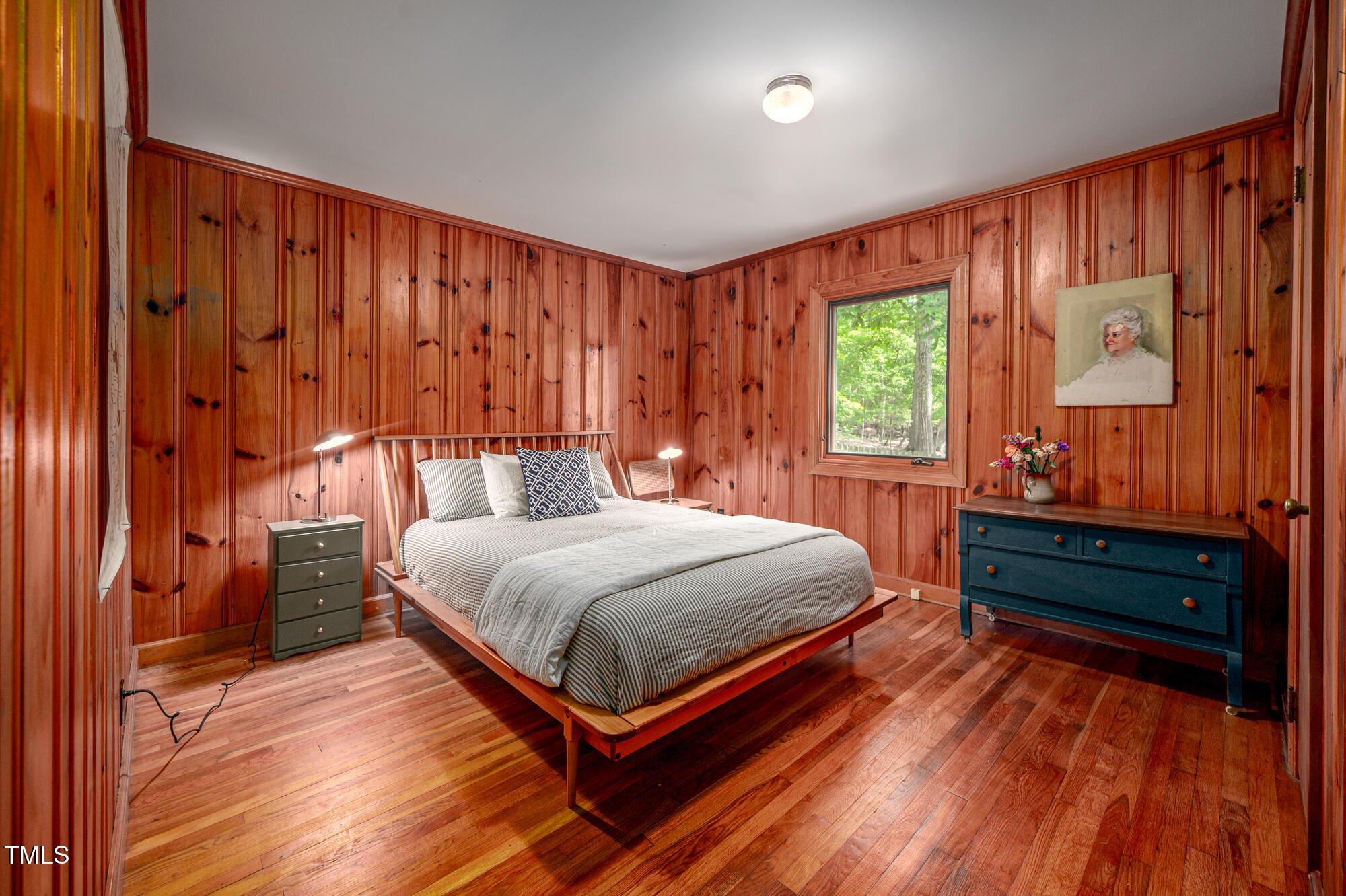 7723 Johnson Mill Road Bahama, NC 27503 - Photo 24 of 58 a bed sitting in a spacious bedroom next to a window