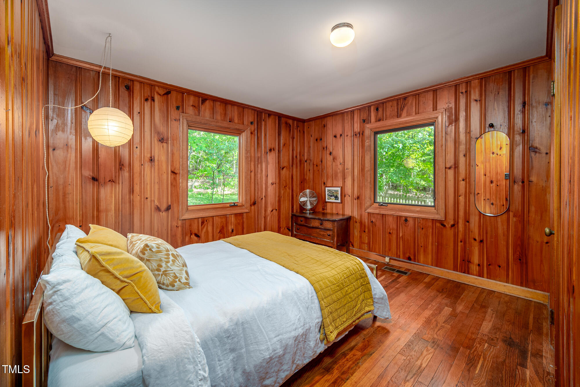 7723 Johnson Mill Road Bahama, NC 27503 - Photo 25 of 58 a bedroom with a bed and window