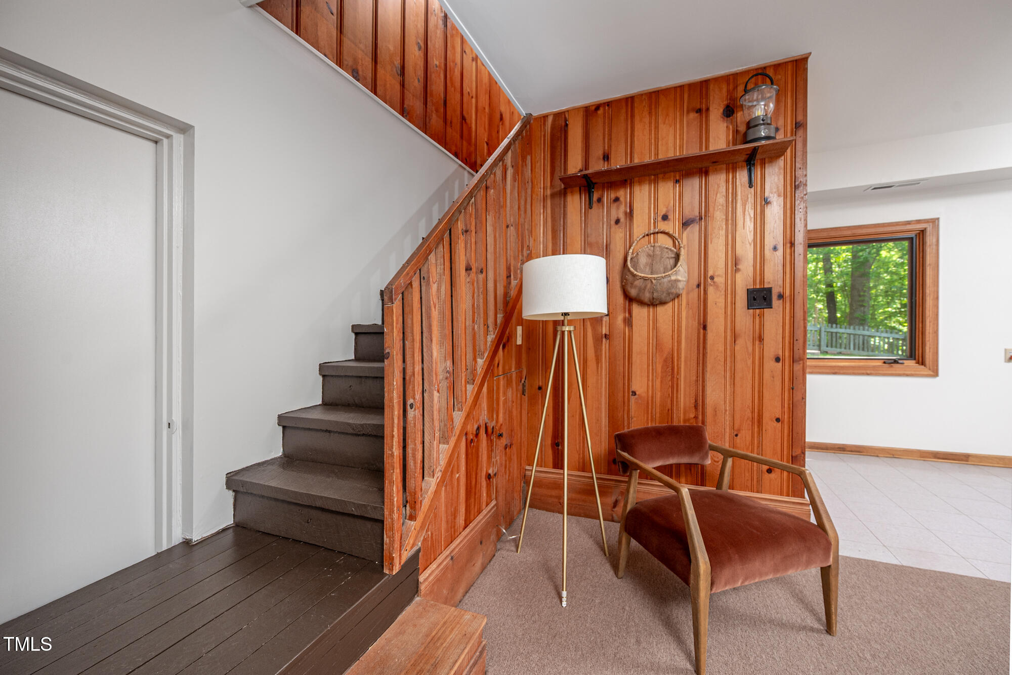 7723 Johnson Mill Road Bahama, NC 27503 - Photo 28 of 58 a view of entryway with wooden floor and chair