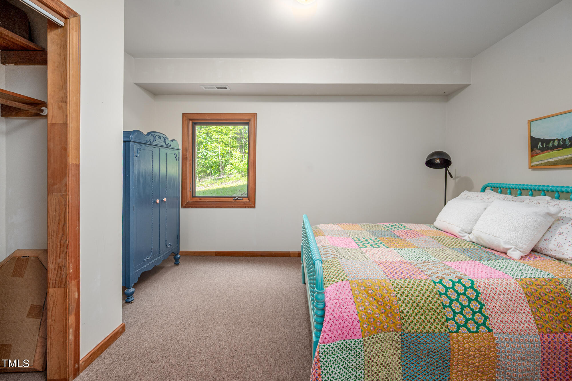 7723 Johnson Mill Road Bahama, NC 27503 - Photo 34 of 58 a bedroom with a bed and a window