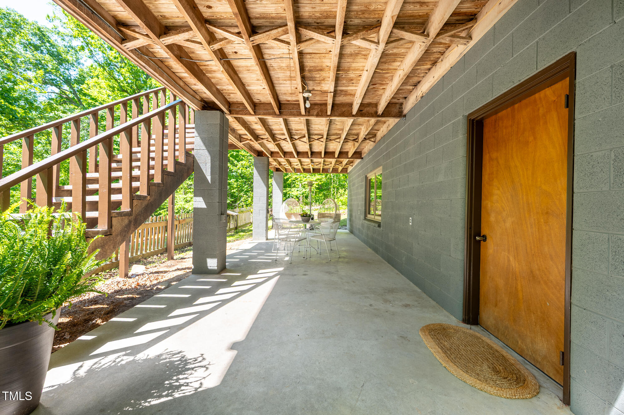 7723 Johnson Mill Road Bahama, NC 27503 - Photo 37 of 58 a view of entryway with a floor to ceiling window and stairs