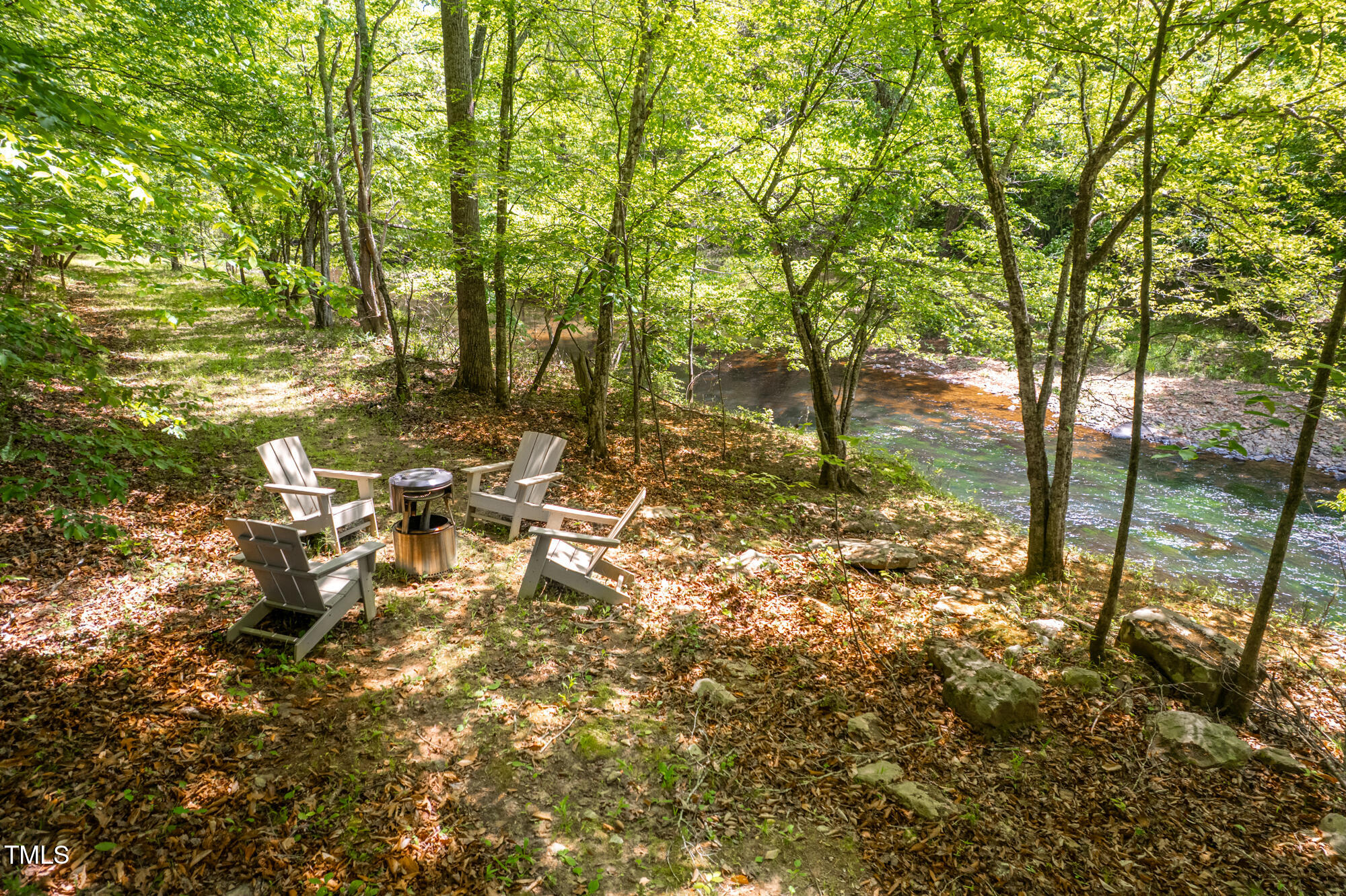 7723 Johnson Mill Road Bahama, NC 27503 - Photo 47 of 58 a backyard of a house with lots of green space