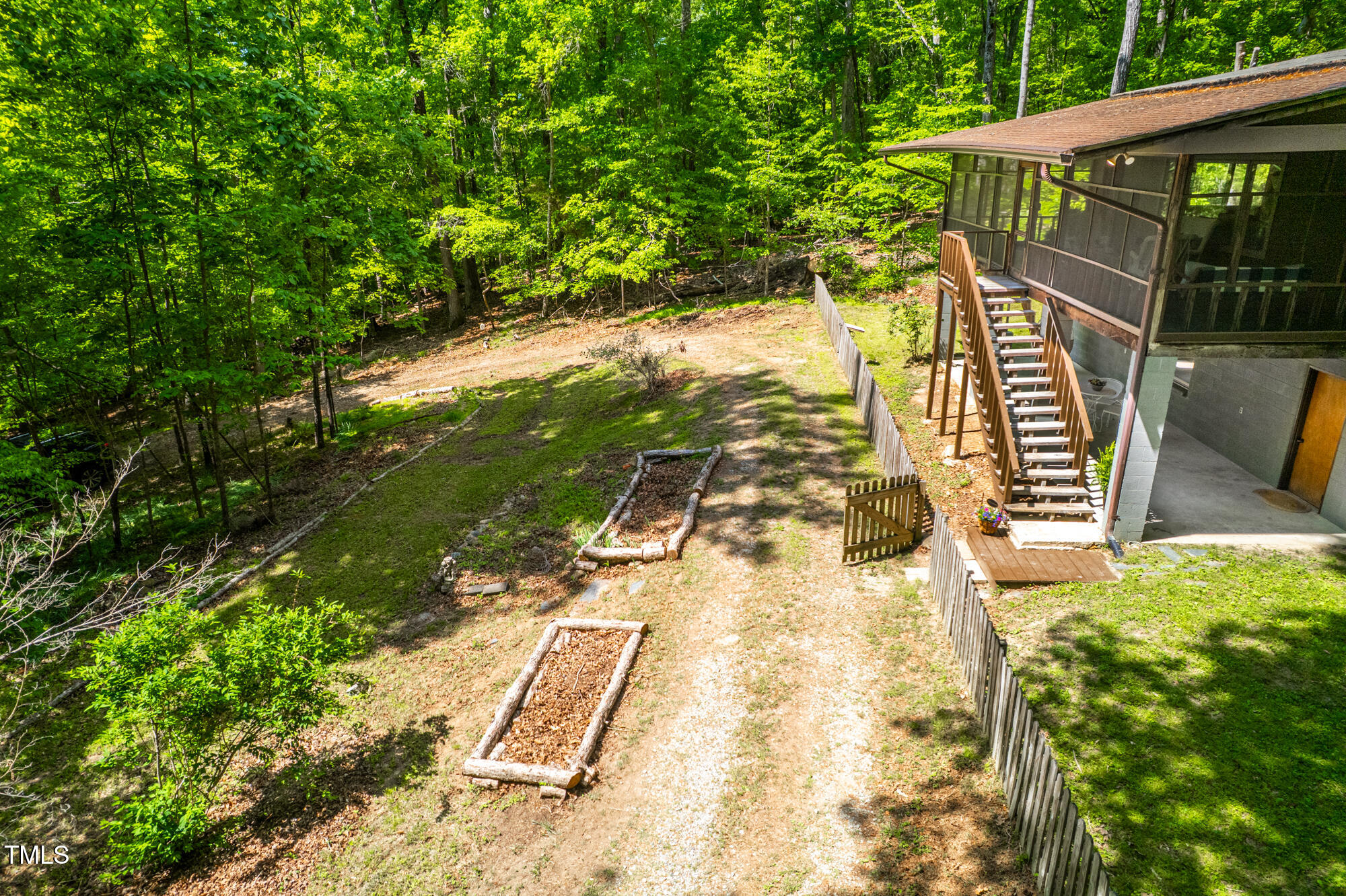 7723 Johnson Mill Road Bahama, NC 27503 - Photo 4 of 58 a view of balcony with wooden floor