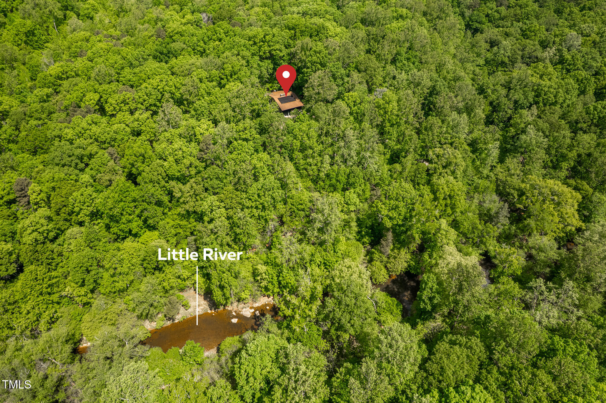 7723 Johnson Mill Road Bahama, NC 27503 - Photo 55 of 58 a backyard of a house with lots of green space
