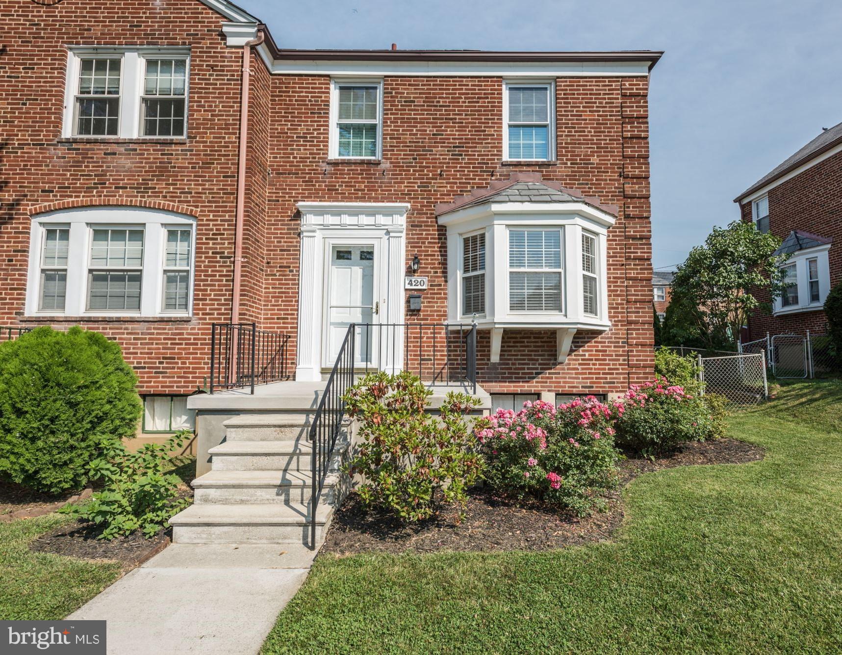 420 Stratford Road Baltimore, MD 21228 - Photo 1 of 26 a front view of a house with garden